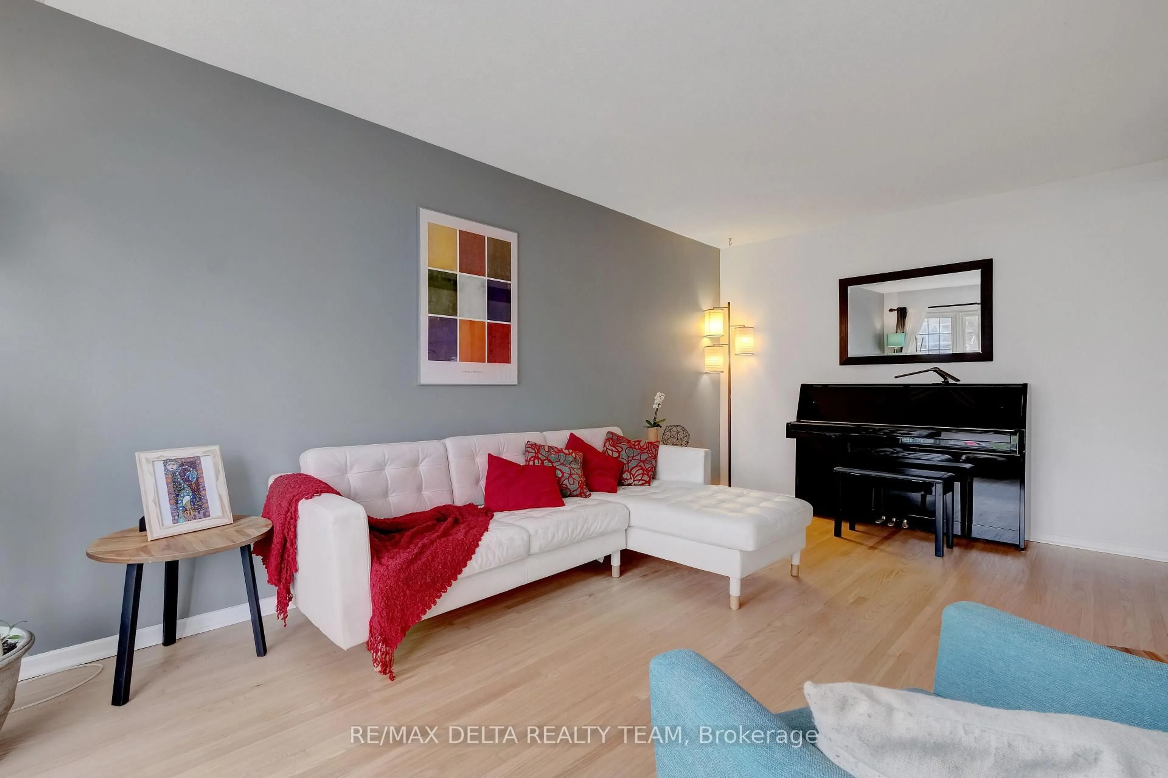 Living room with furniture, wood/laminate floor for 2210 Bickerton Ave, Ottawa Ontario K1J 6Y3