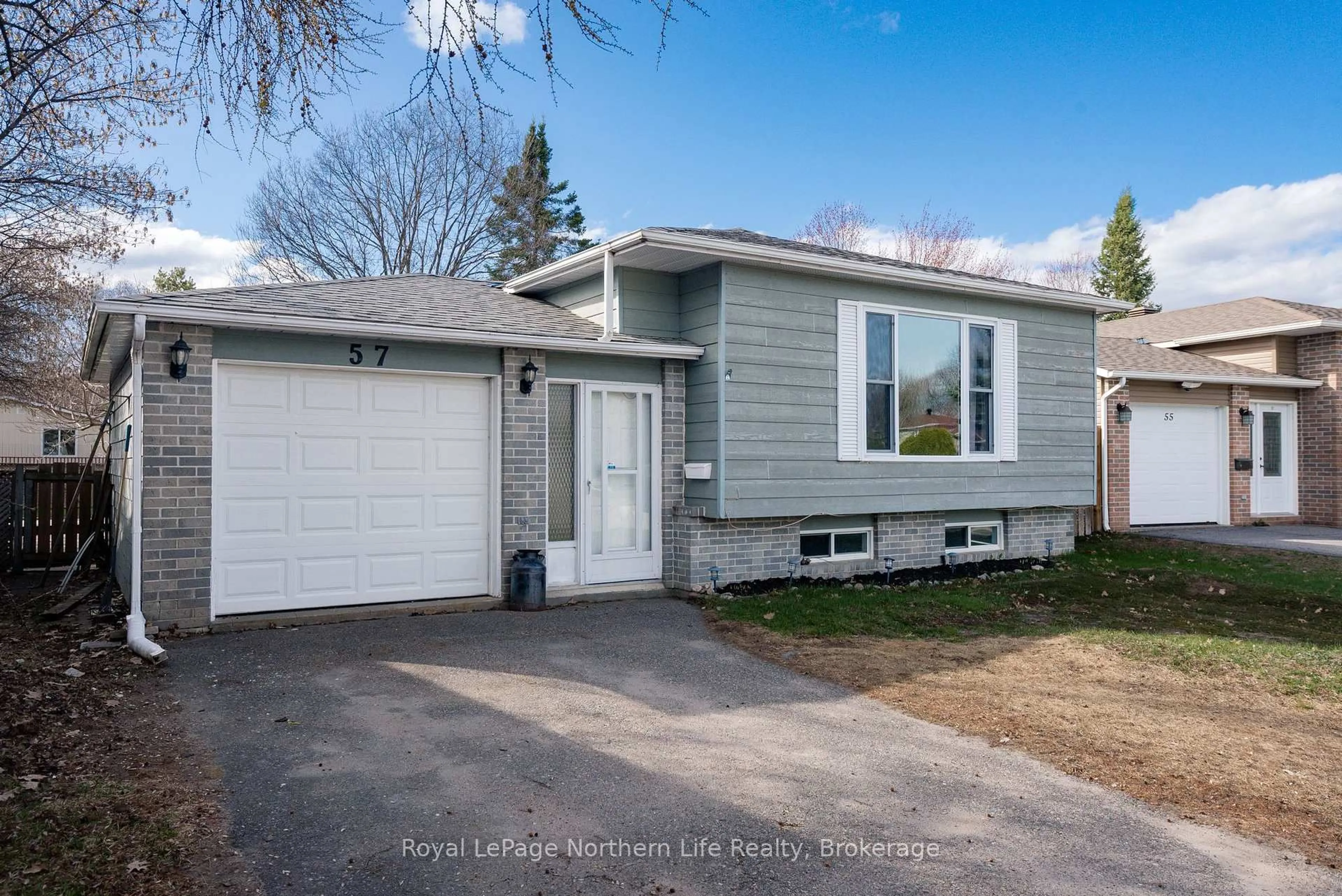 Home with vinyl exterior material, street for 57 Nancy Dr, North Bay Ontario P1B 9M1