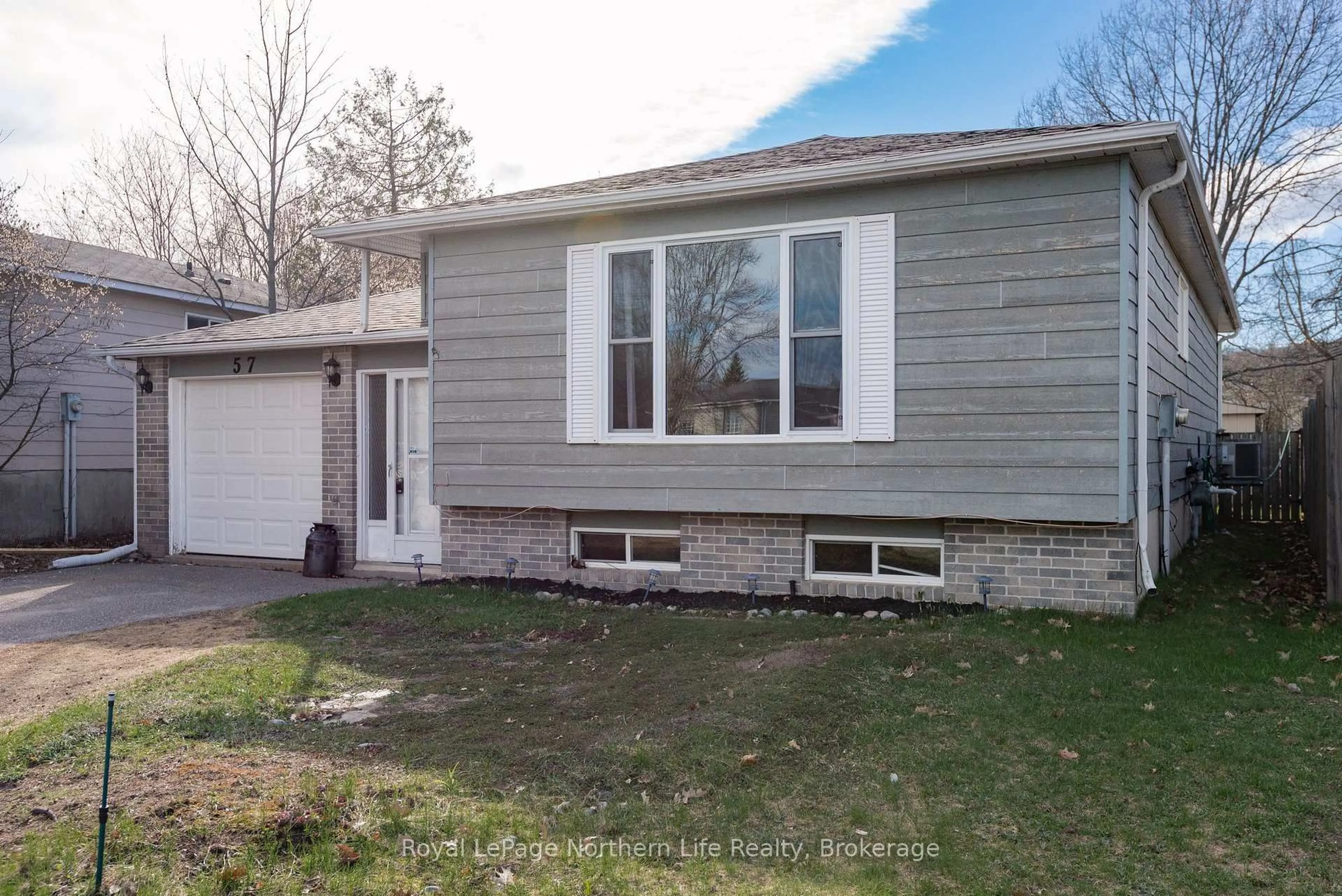 Home with vinyl exterior material, street for 57 Nancy Dr, North Bay Ontario P1B 9M1