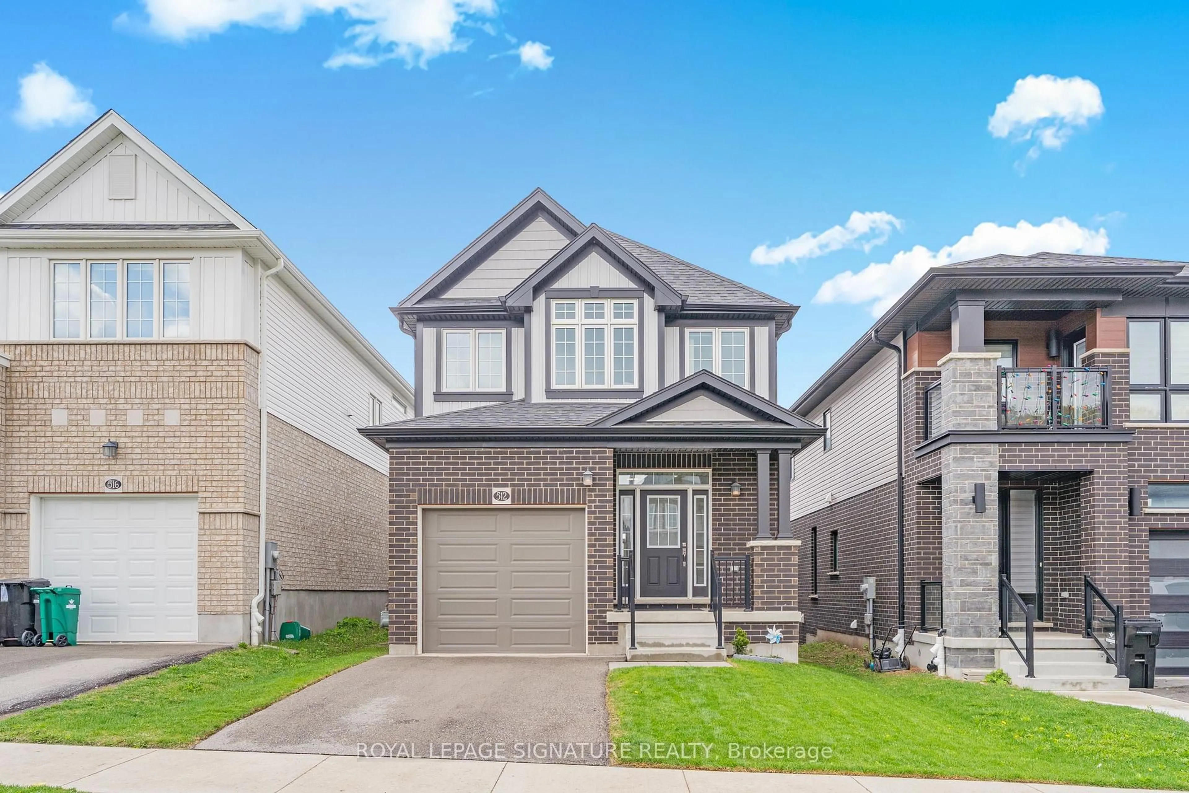 Home with brick exterior material, street for 512 Nathalie Cres, Kitchener Ontario N2E 0H8