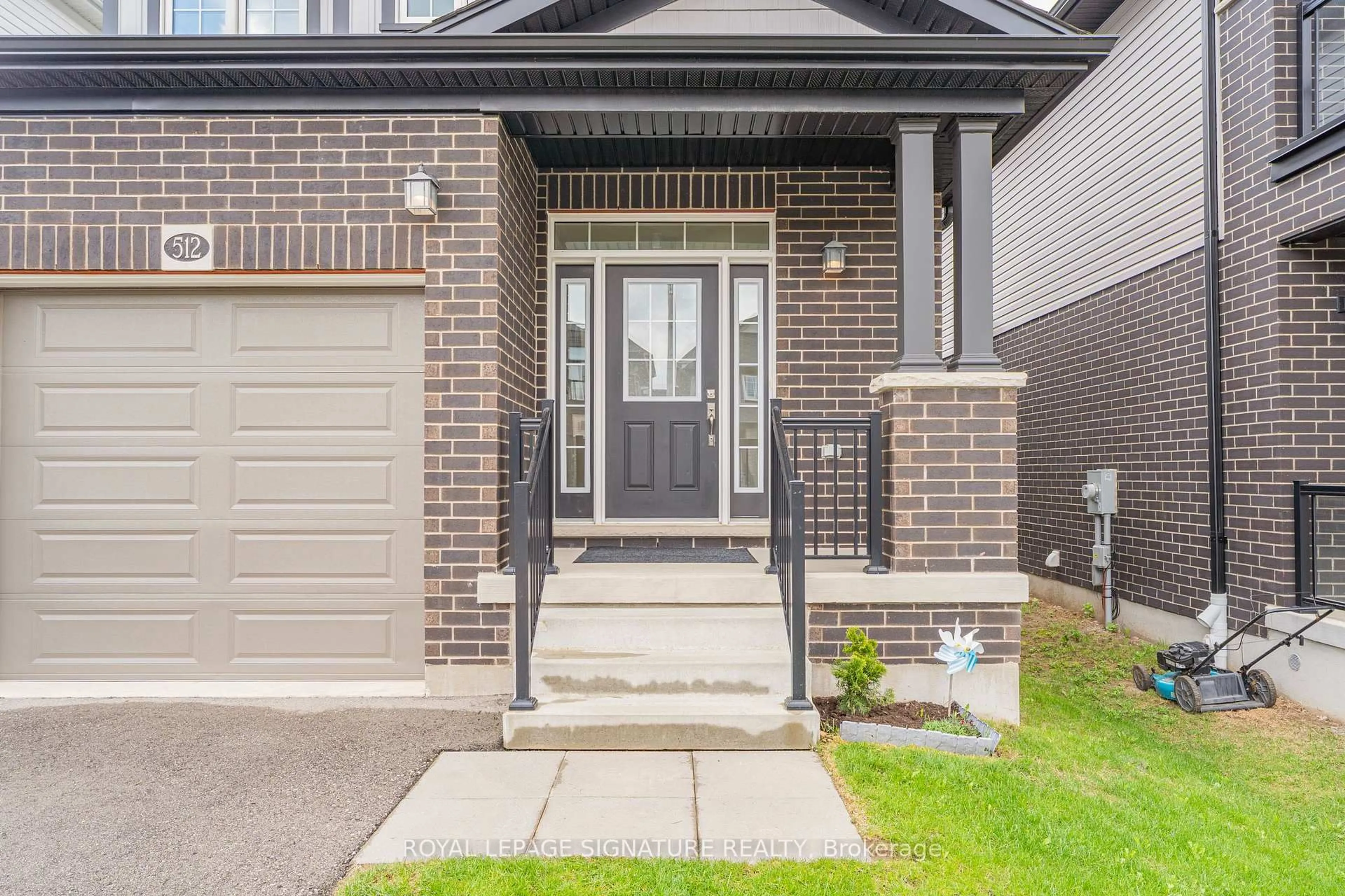 Home with brick exterior material, street for 512 Nathalie Cres, Kitchener Ontario N2E 0H8