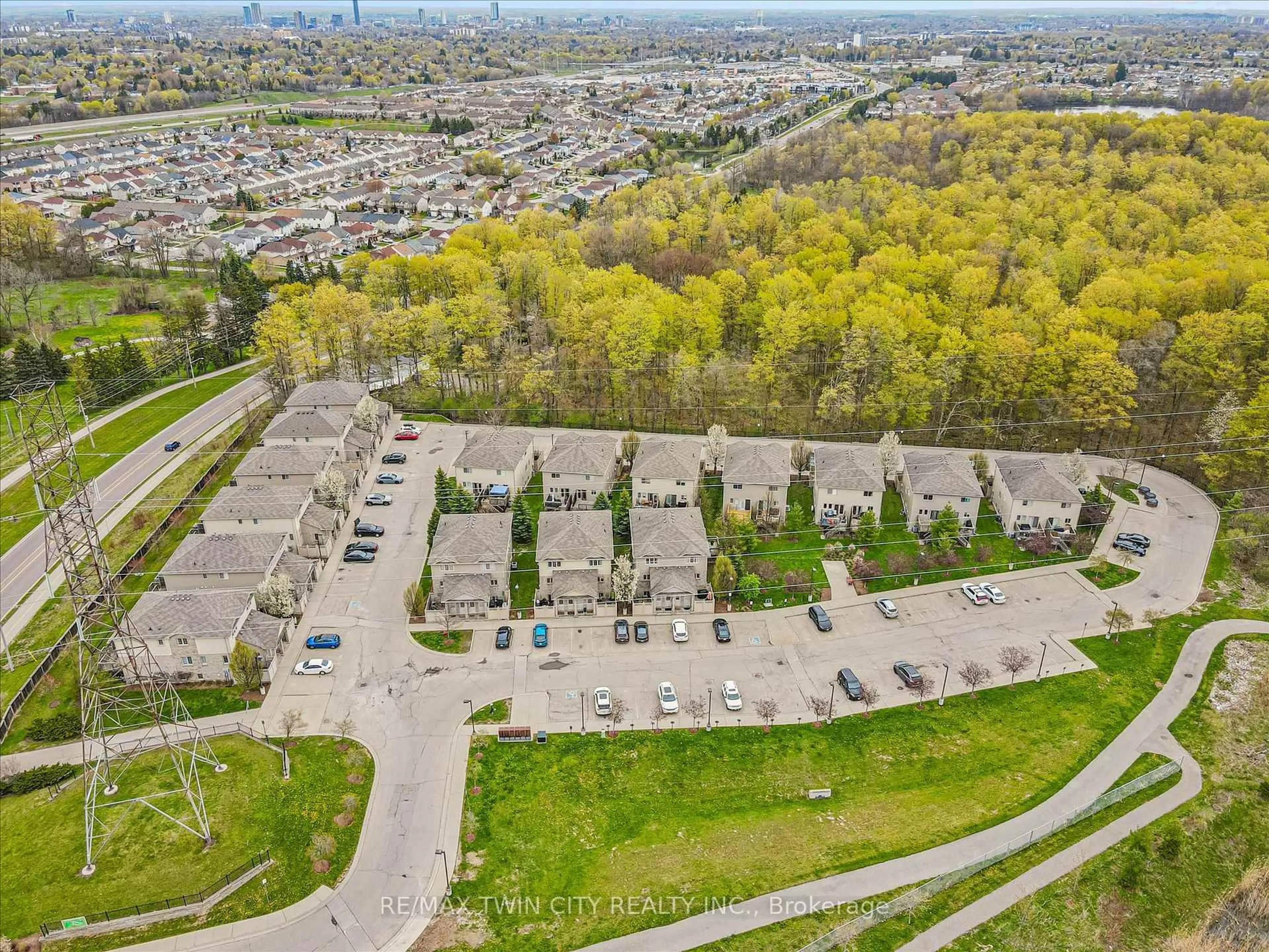 A pic from outside/outdoor area/front of a property/back of a property/a pic from drone, street for 1941 Ottawa St #15B, Kitchener Ontario N2E 0C2