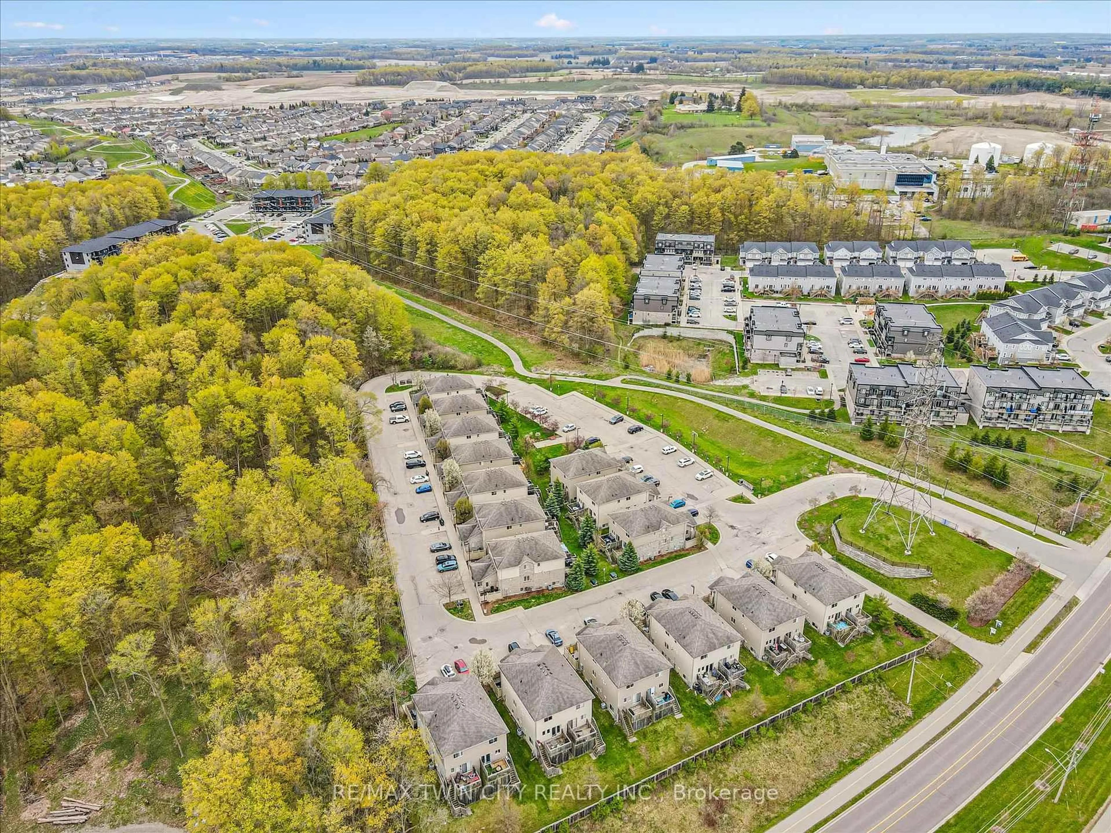 A pic from outside/outdoor area/front of a property/back of a property/a pic from drone, unknown for 1941 Ottawa St #15B, Kitchener Ontario N2E 0C2