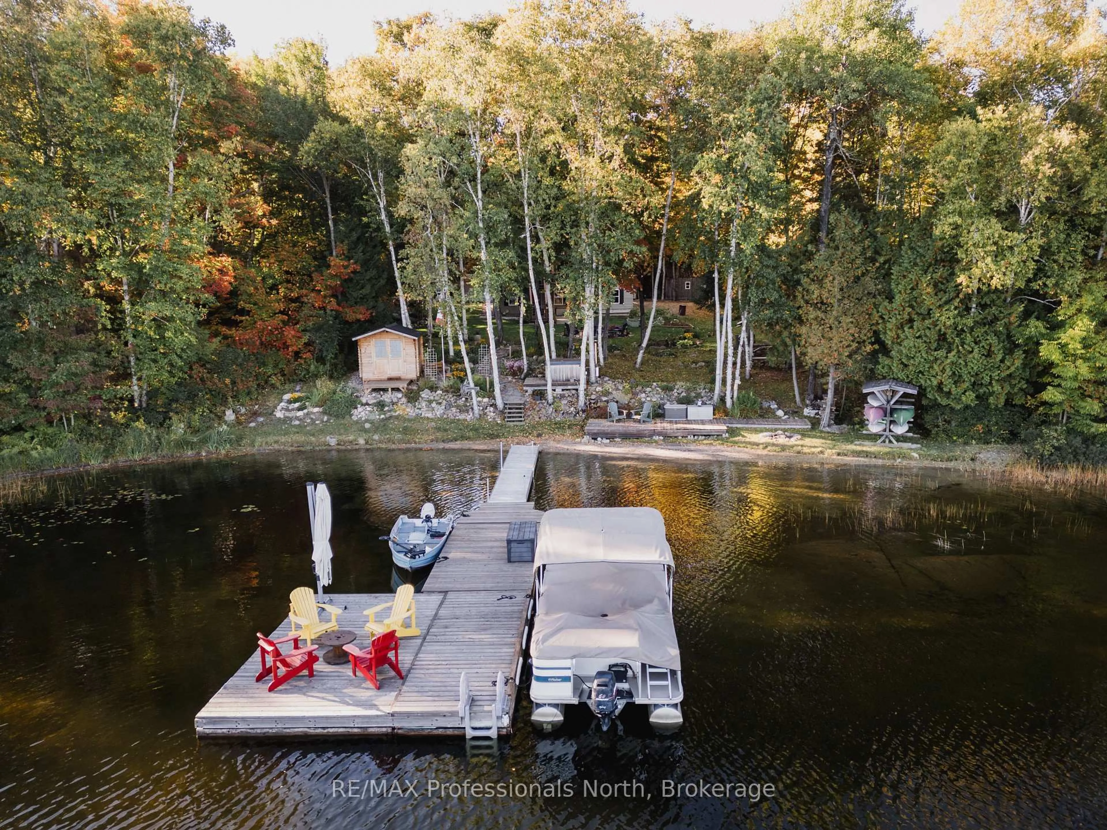 A pic from outside/outdoor area/front of a property/back of a property/a pic from drone, water/lake/river/ocean view for 1173 SPRING LAKE Rd, Parry Sound Remote Area Ontario P0A 1X0