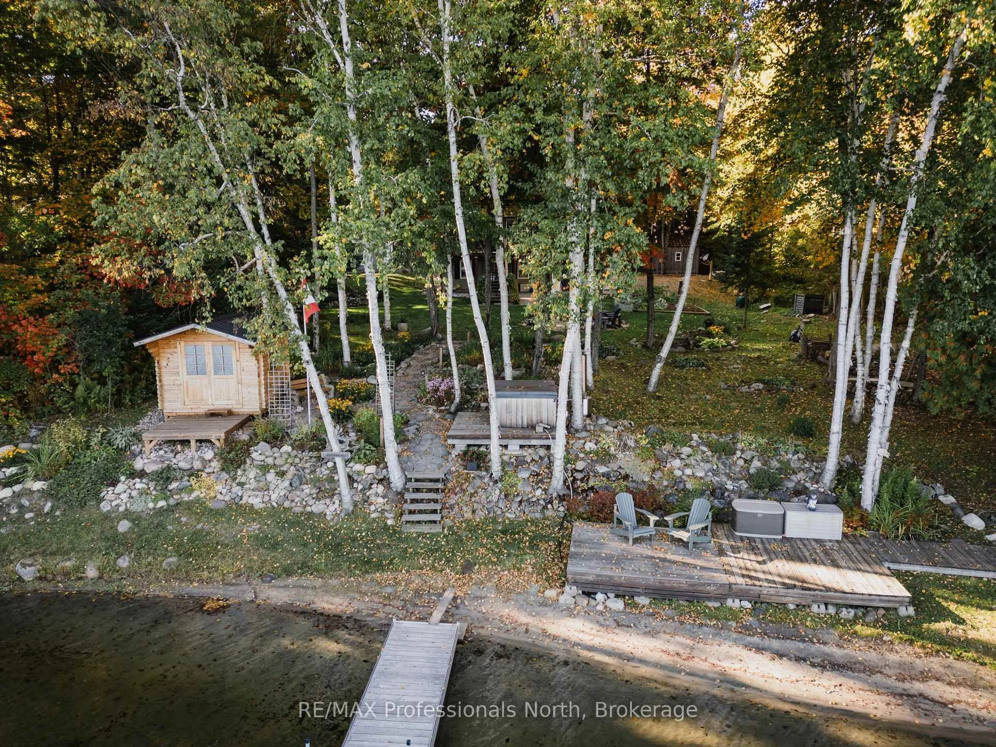 A pic from outside/outdoor area/front of a property/back of a property/a pic from drone, forest/trees view for 1173 SPRING LAKE Rd, Parry Sound Remote Area Ontario P0A 1X0