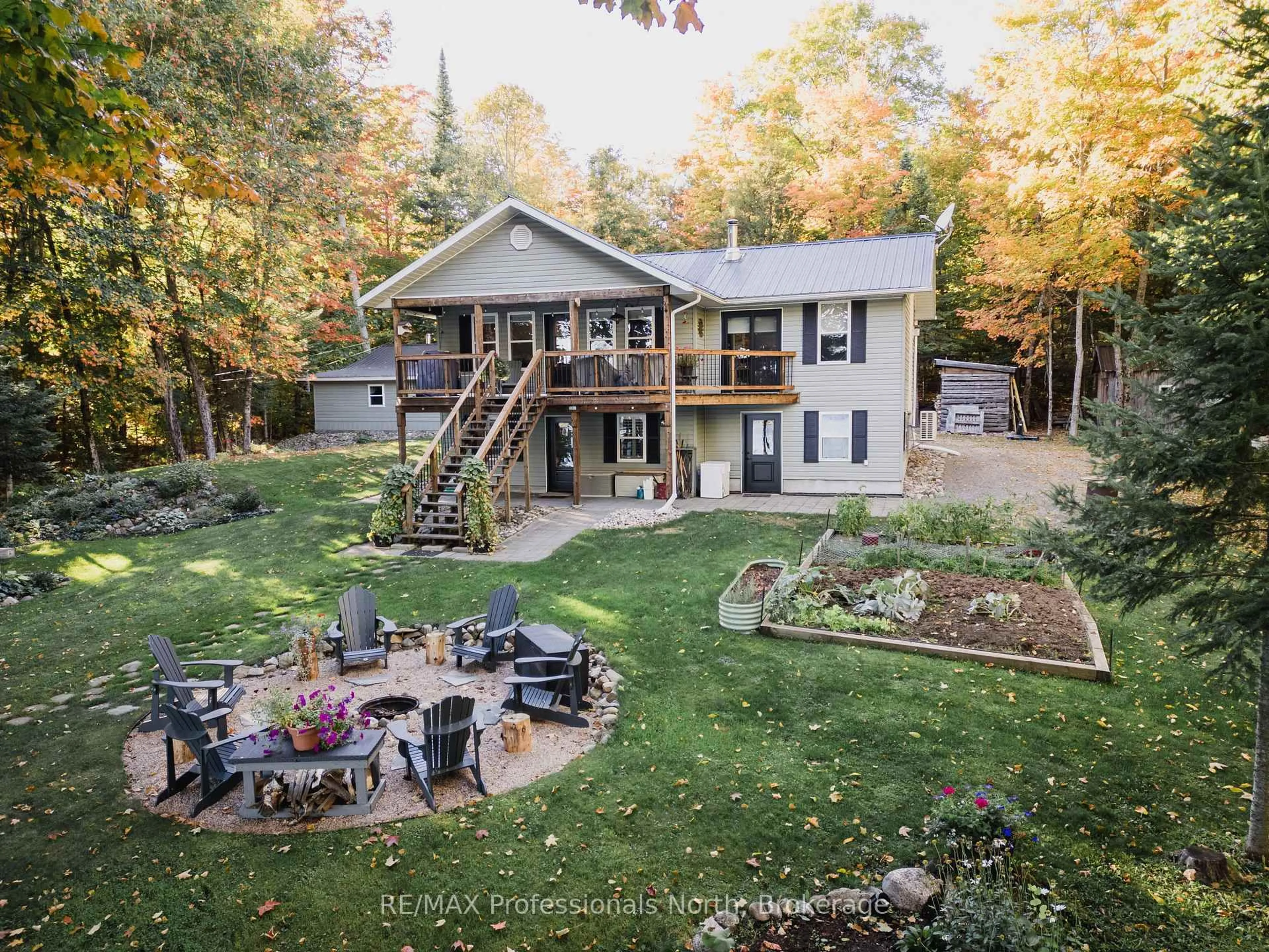 A pic from outside/outdoor area/front of a property/back of a property/a pic from drone, unknown for 1173 SPRING LAKE Rd, Parry Sound Remote Area Ontario P0A 1X0
