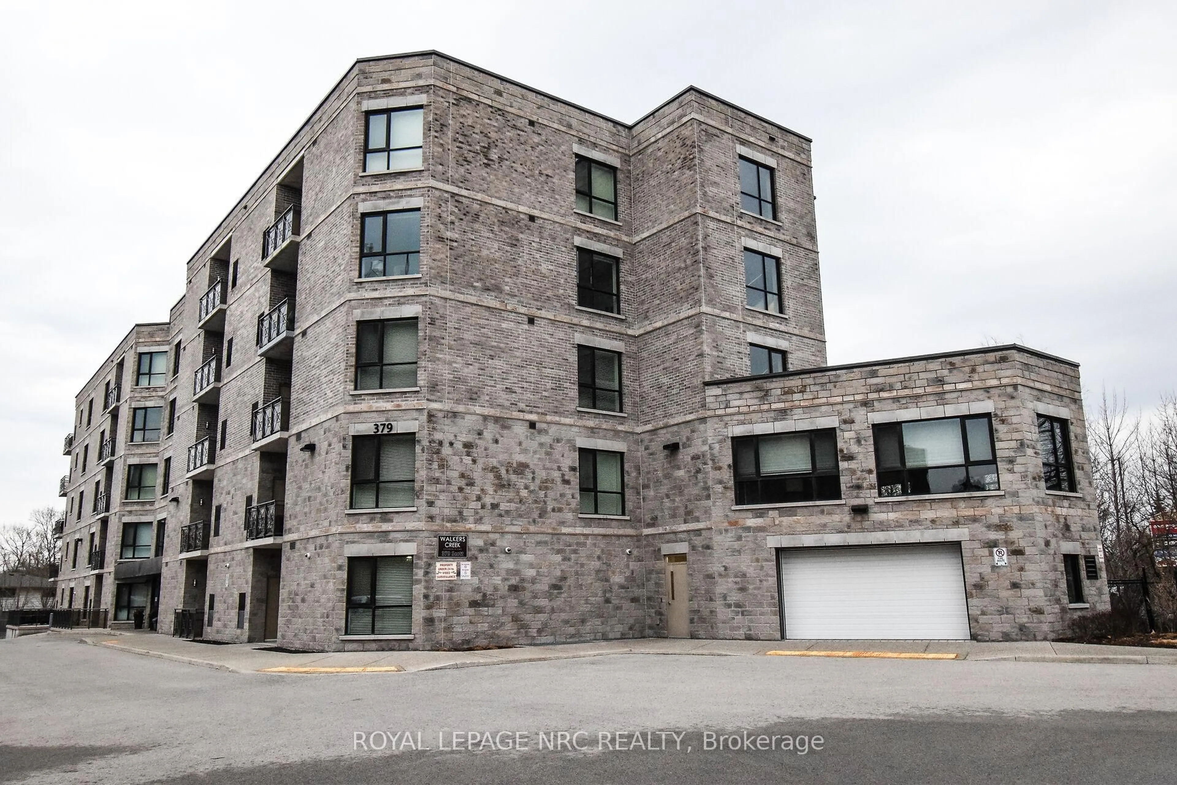 A pic from outside/outdoor area/front of a property/back of a property/a pic from drone, building for 379 Scott St #305, St. Catharines Ontario L2M 3W2