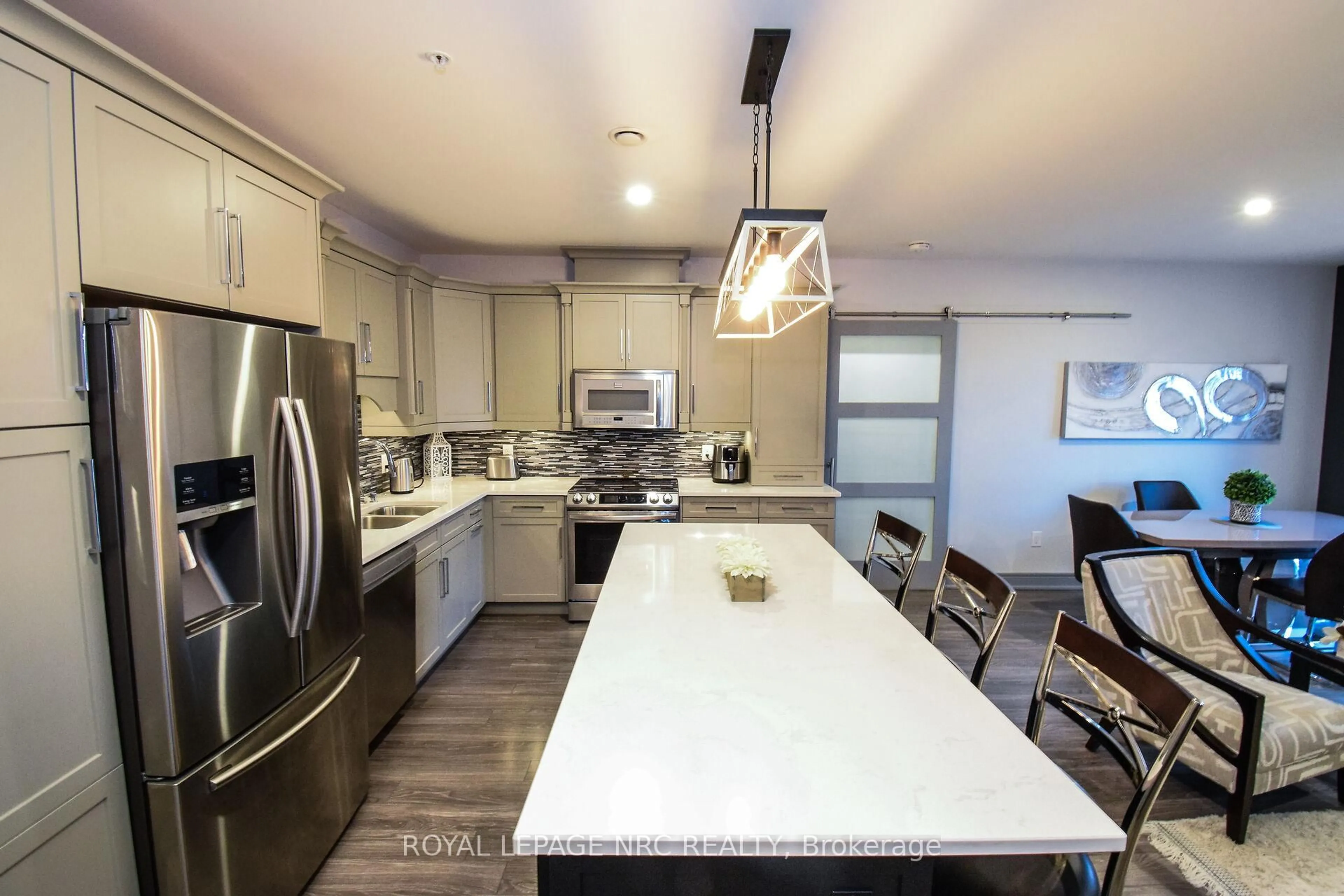Open concept kitchen, unknown for 379 Scott St #305, St. Catharines Ontario L2M 3W2