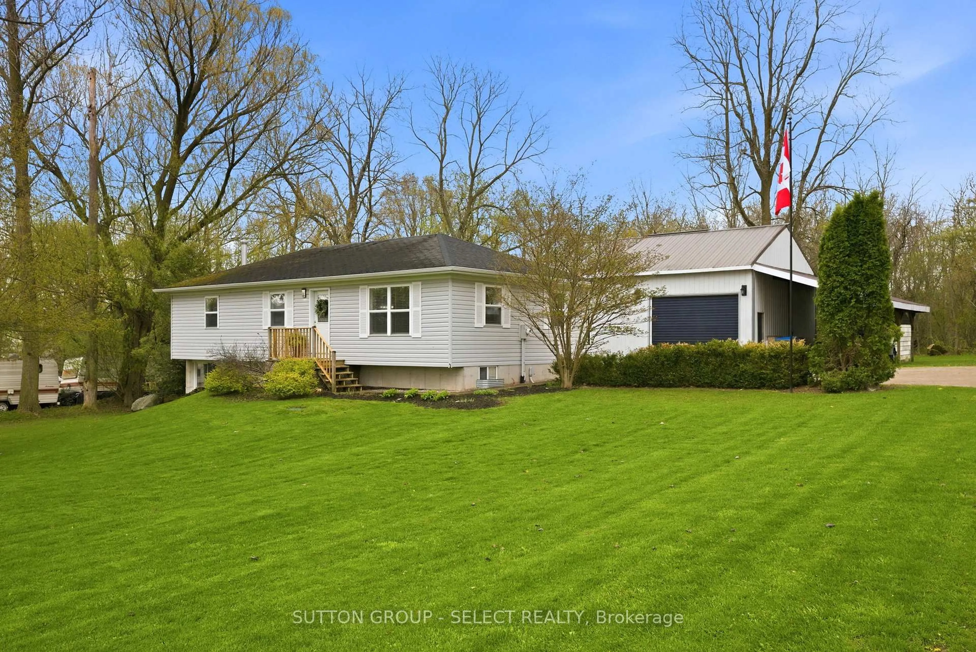 Home with vinyl exterior material, street for 41165 Kirkton Rd, South Huron Ontario N0M 1S5
