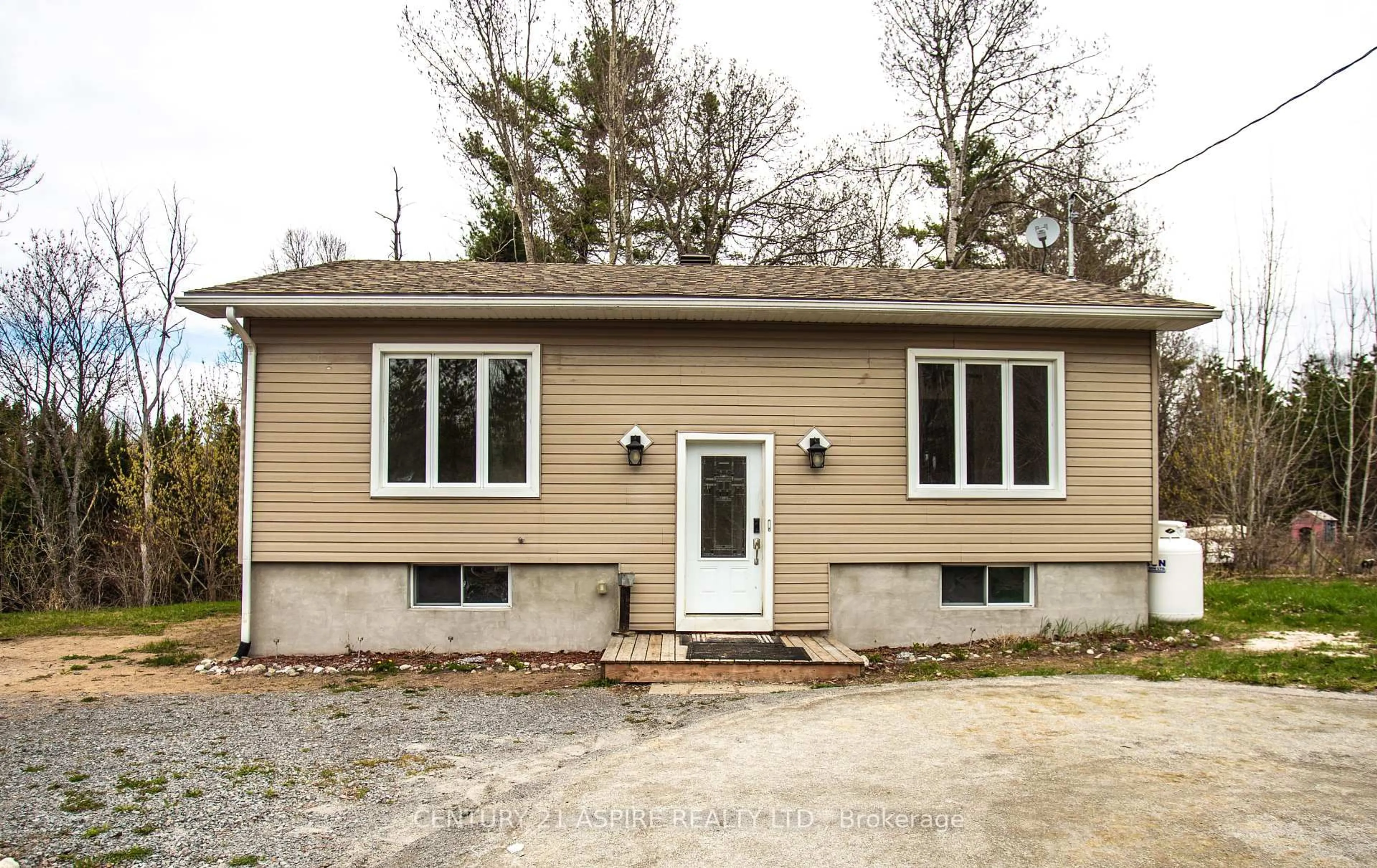 Home with vinyl exterior material, street for 84 Sandy Beach Rd, Pembroke Ontario K8A 6W8