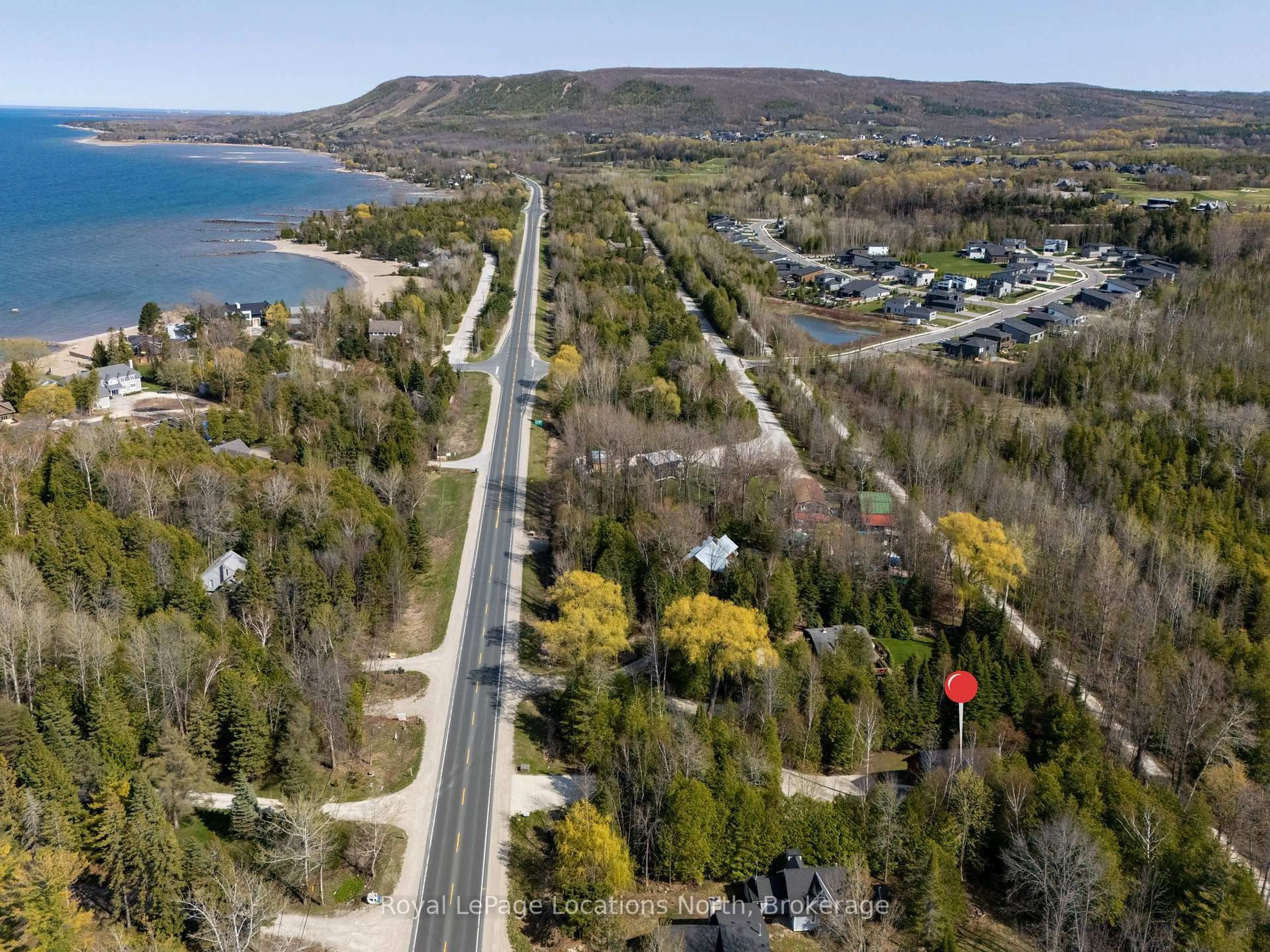 A pic from outside/outdoor area/front of a property/back of a property/a pic from drone, unknown for 208554 26 Highway, Blue Mountains Ontario N0H 1J0