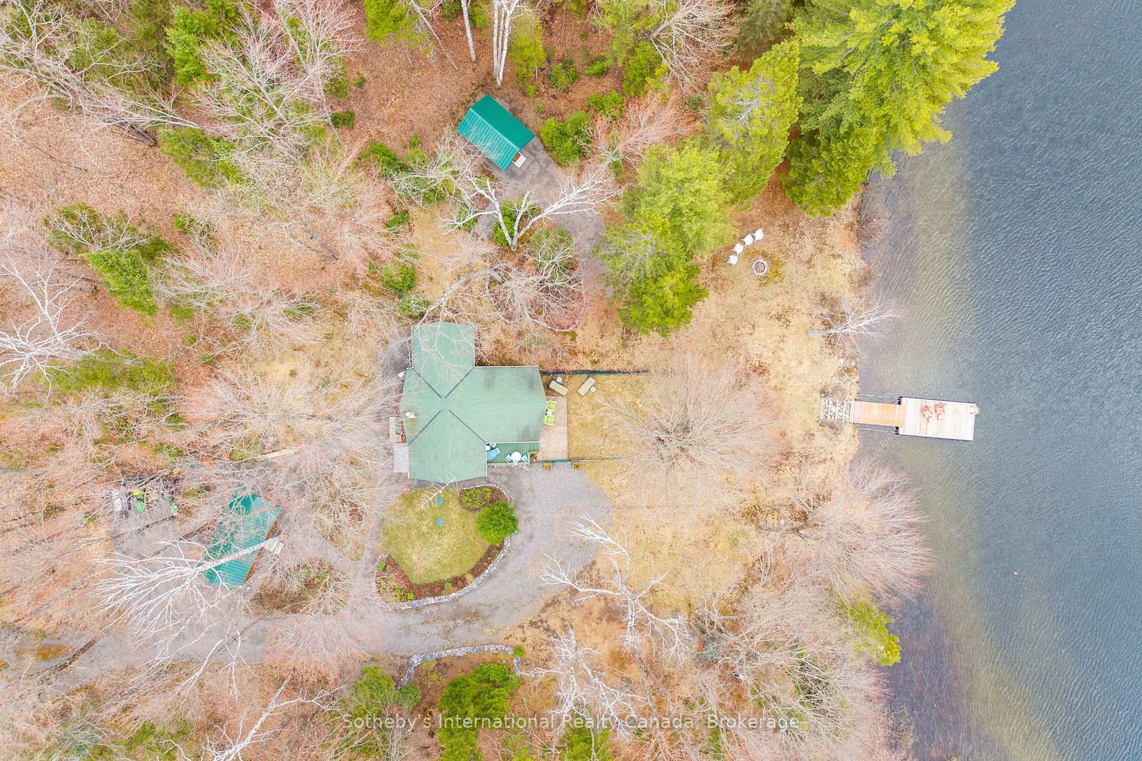 A pic from outside/outdoor area/front of a property/back of a property/a pic from drone, forest/trees view for 1041 Crockford Lane, Bracebridge Ontario P1L 1X3