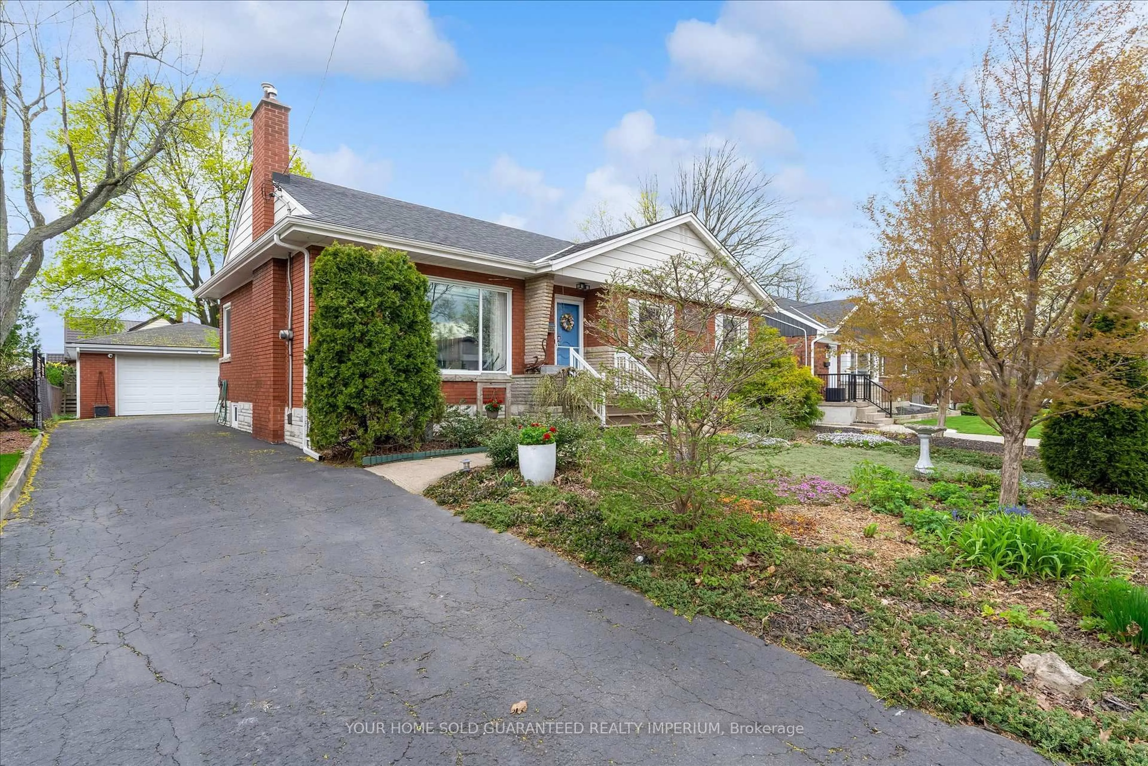 Home with brick exterior material, street for 8 Mulock Ave, Hamilton Ontario L8T 1H3