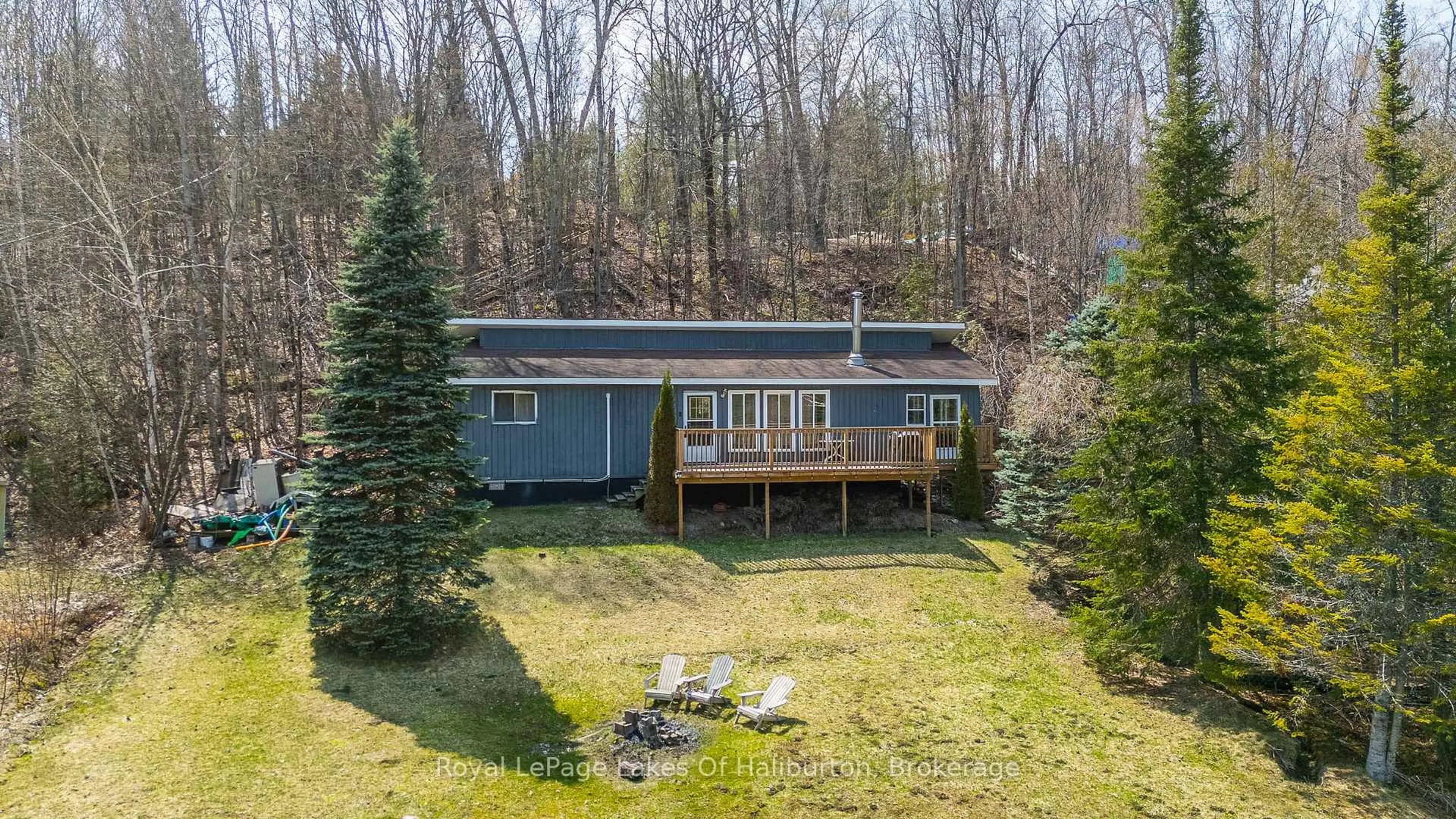 A pic from outside/outdoor area/front of a property/back of a property/a pic from drone, unknown for 1027 Spencers Tr, Highlands East Ontario K0M 1X0