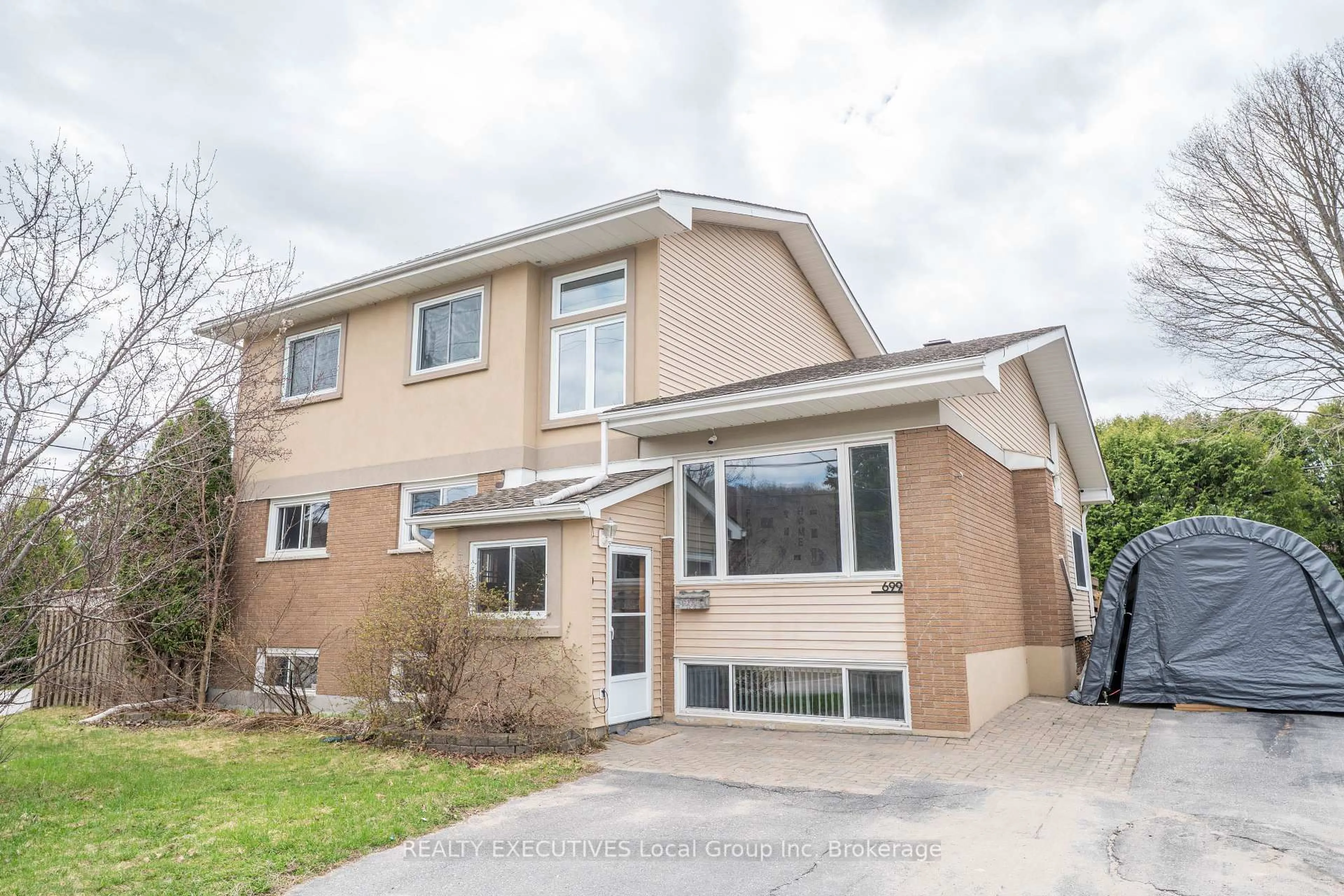 Home with brick exterior material, street for 699 Norman Ave, North Bay Ontario P1B 8C2