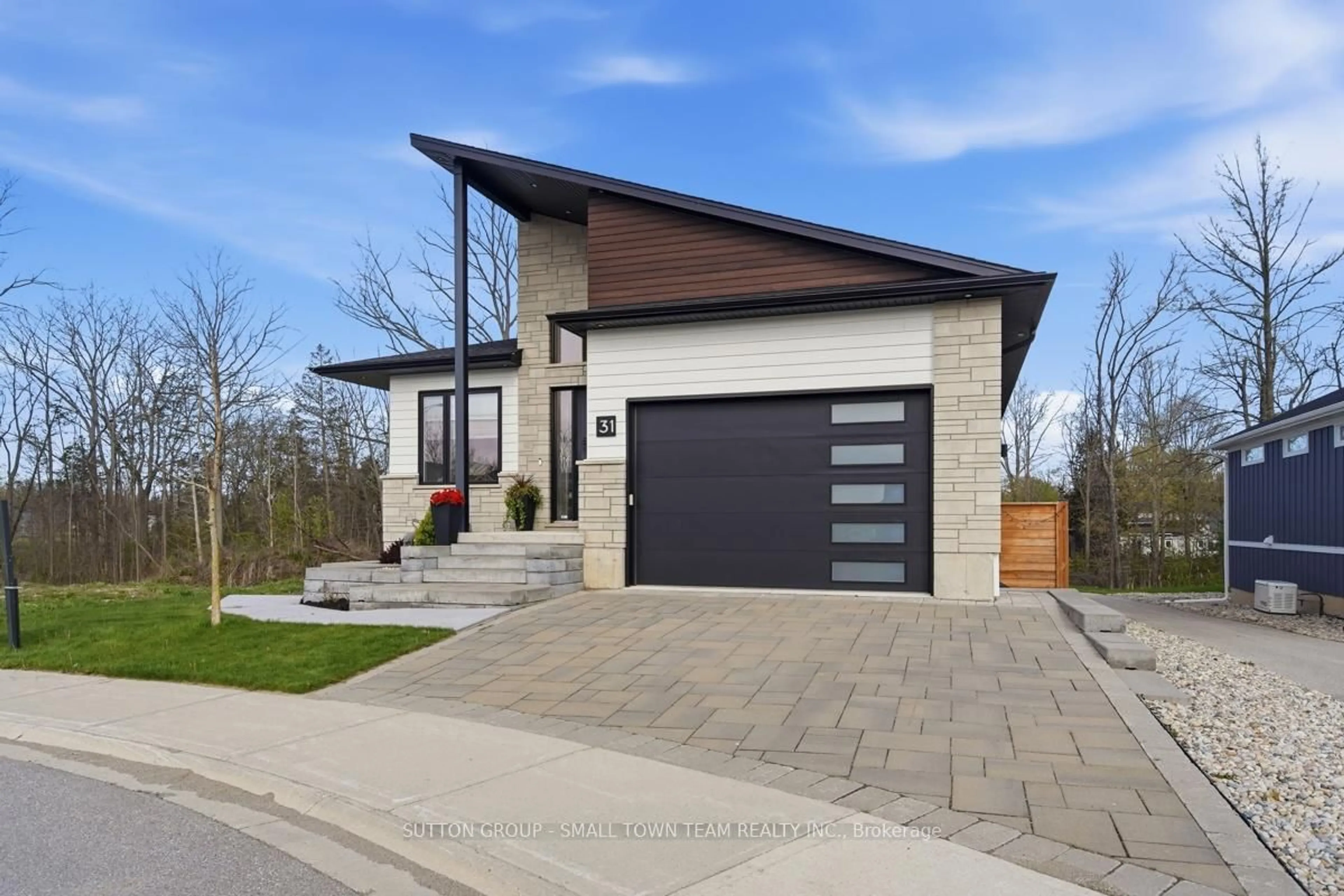 Home with brick exterior material, street for 31 Creekside Pl, Lambton Shores Ontario N0M 1T0
