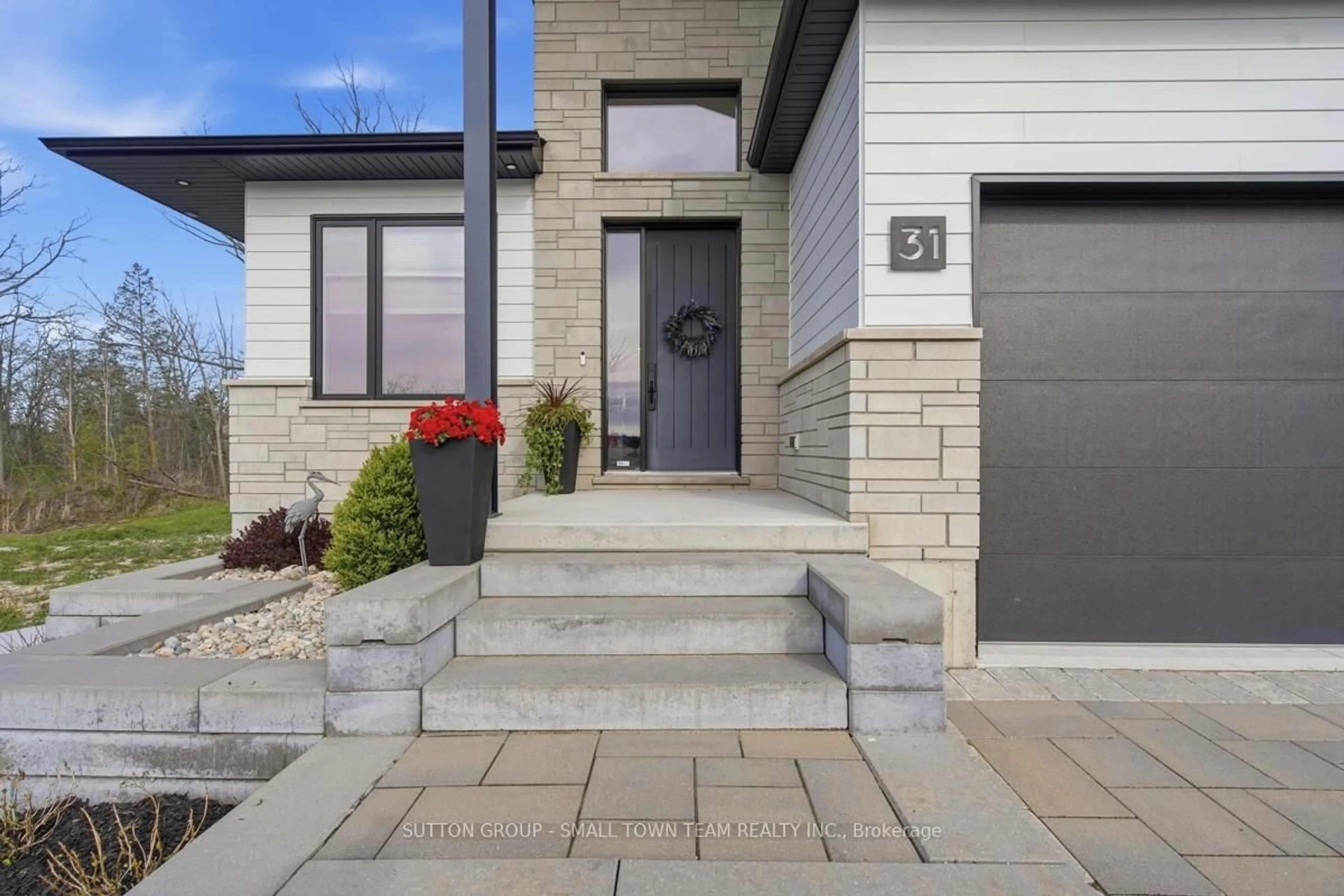 Home with brick exterior material, street for 31 Creekside Pl, Lambton Shores Ontario N0M 1T0