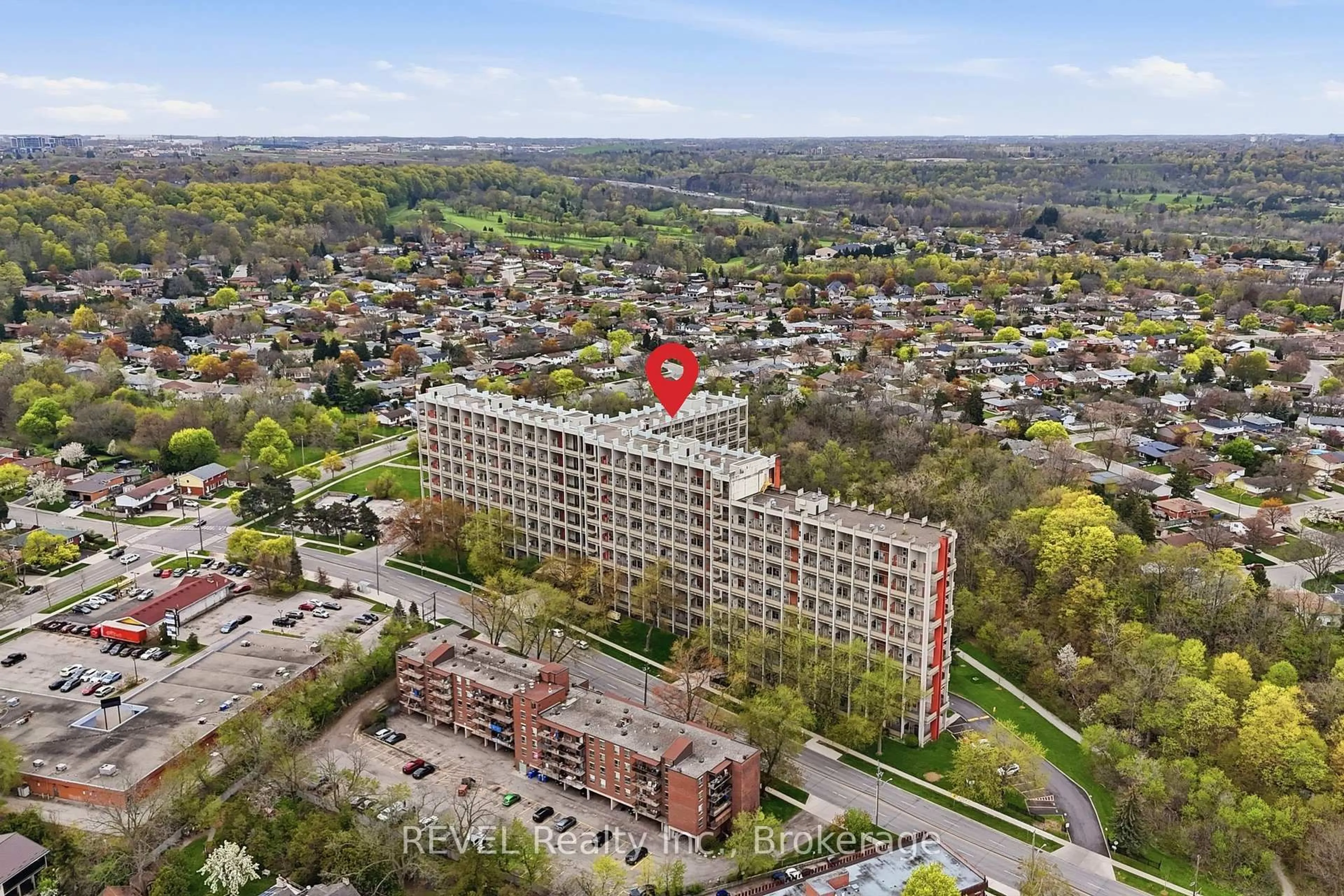 A pic from outside/outdoor area/front of a property/back of a property/a pic from drone, building for 350 Quigley Rd #824, Hamilton Ontario L8K 5N2