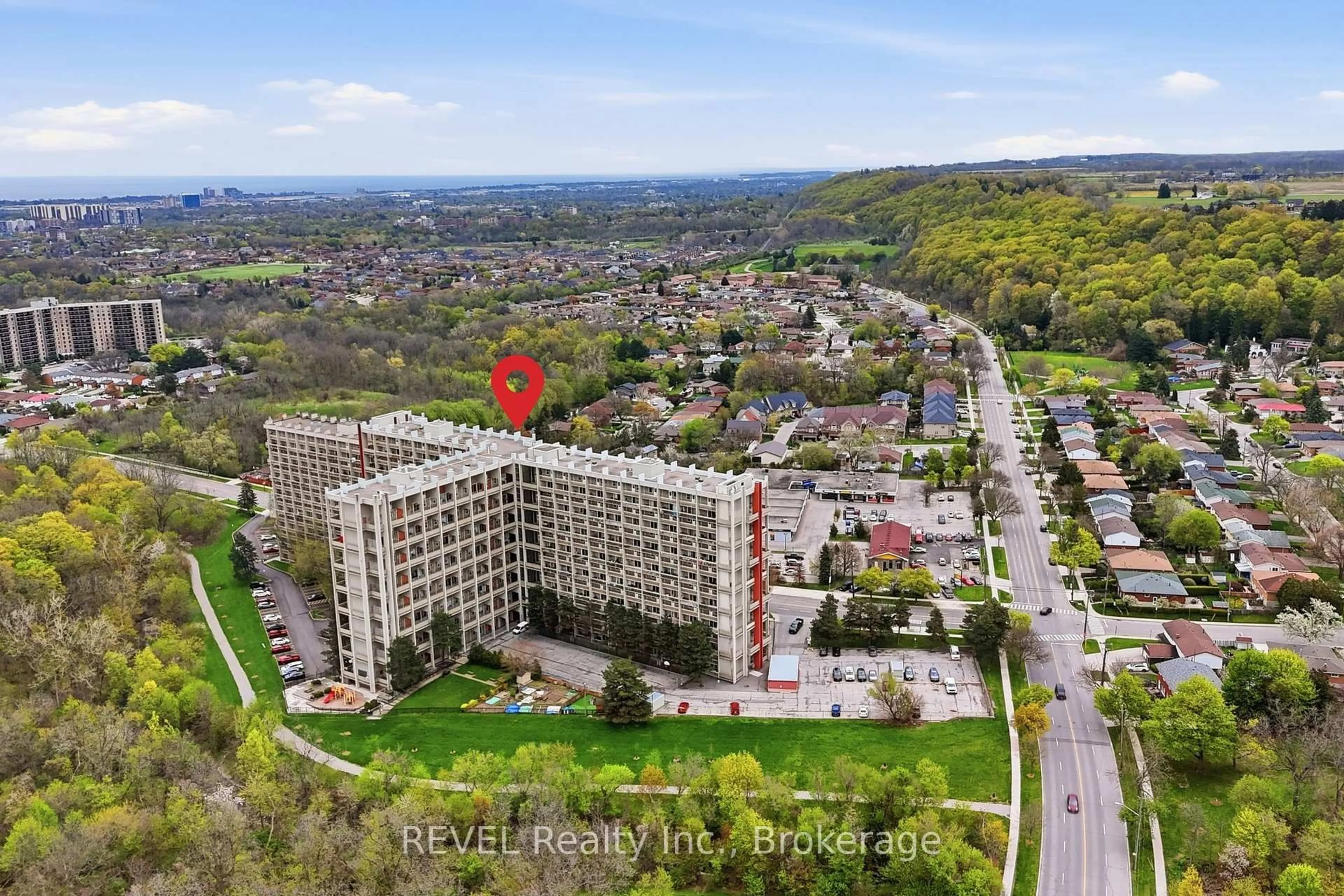 A pic from outside/outdoor area/front of a property/back of a property/a pic from drone, unknown for 350 Quigley Rd #824, Hamilton Ontario L8K 5N2