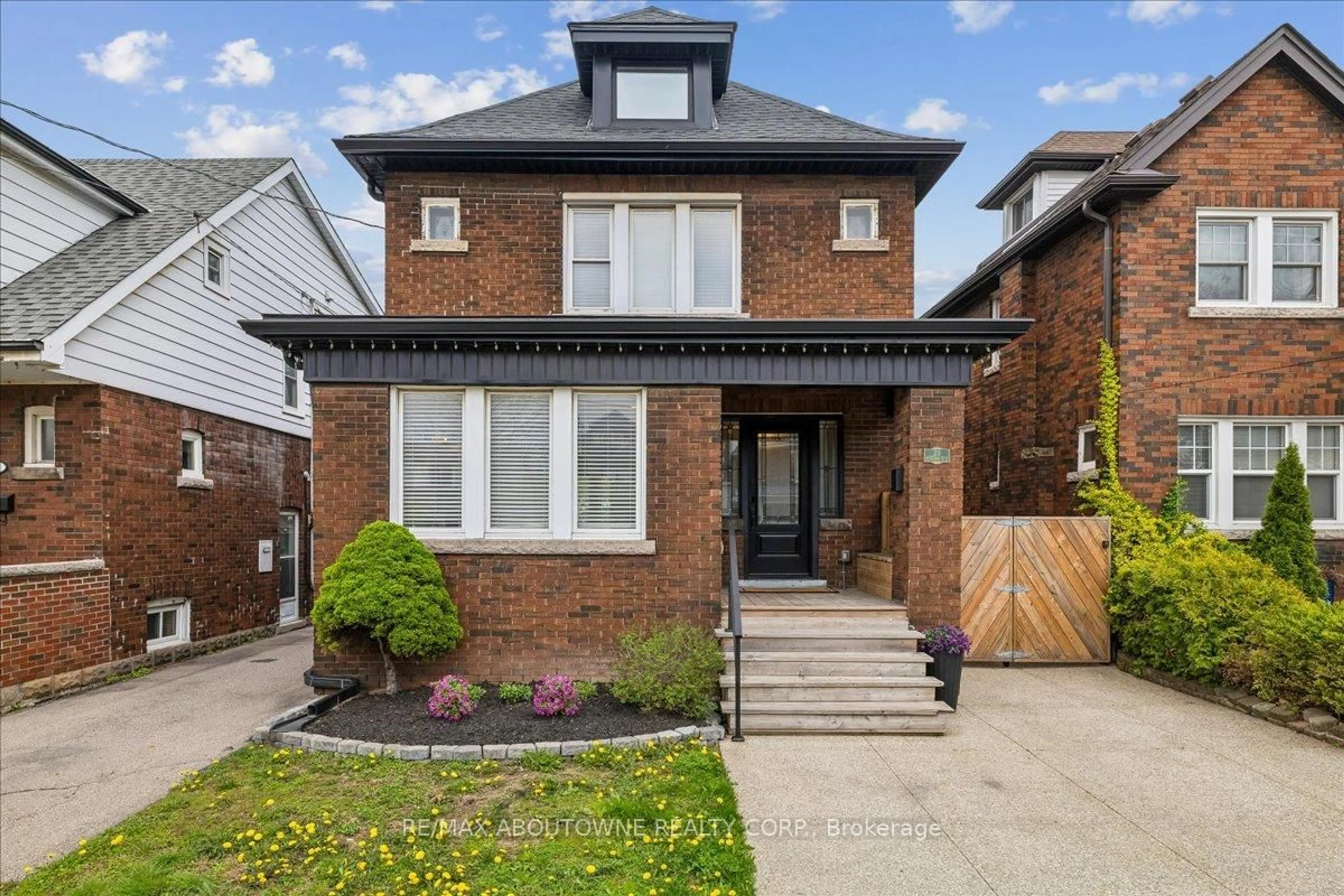 Home with brick exterior material, street for 23 Ottawa St, Hamilton Ontario L8K 2C9