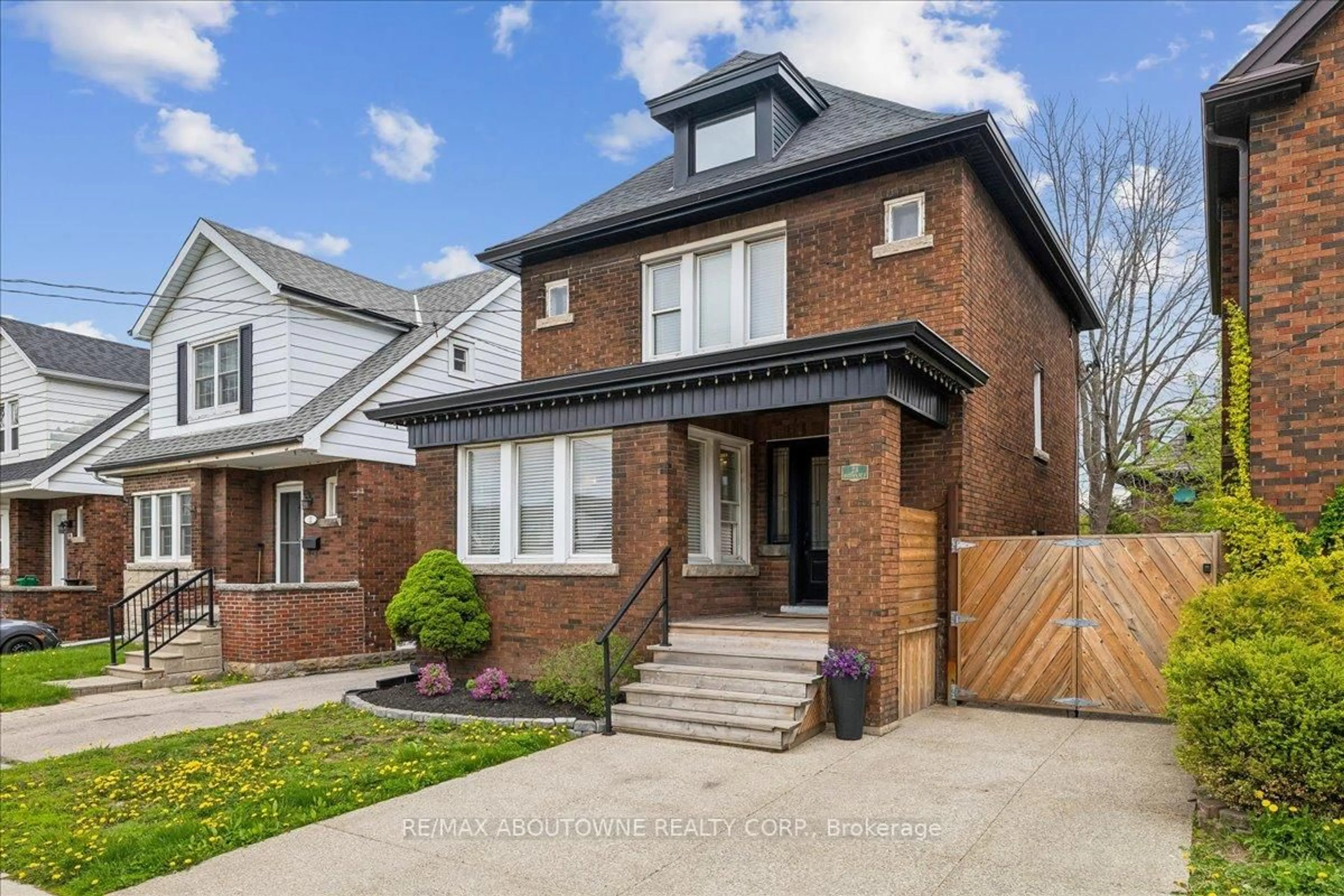 Home with brick exterior material, street for 23 Ottawa St, Hamilton Ontario L8K 2C9
