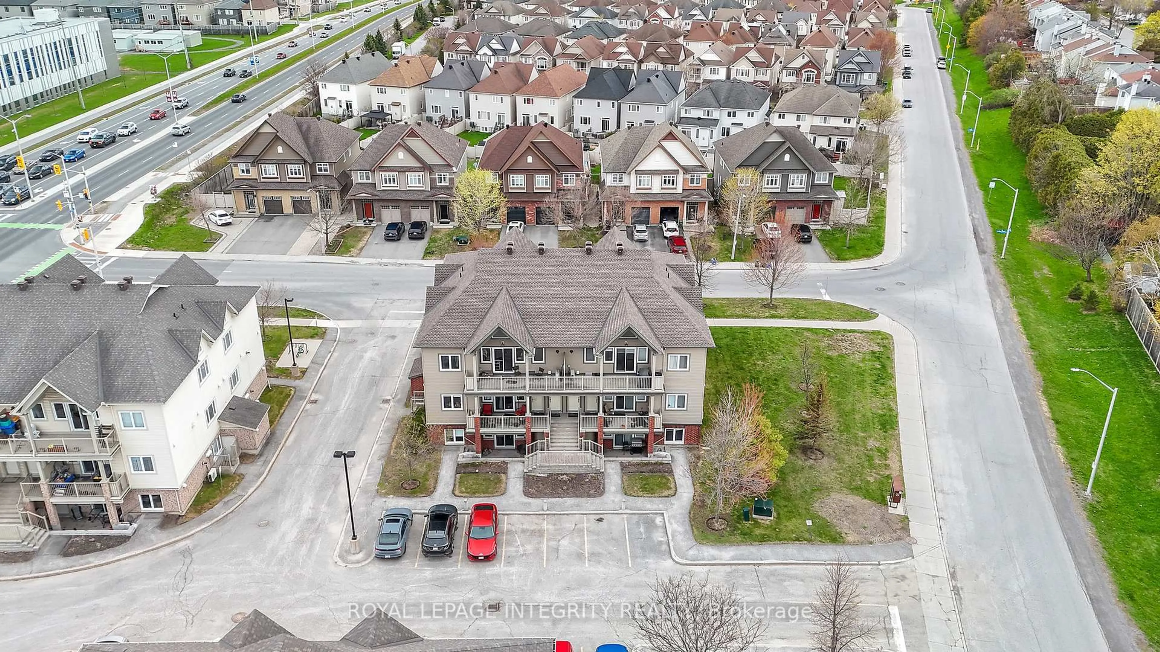 A pic from outside/outdoor area/front of a property/back of a property/a pic from drone, street for 105 Fraser Fields Way #K, Ottawa Ontario K2J 5V1