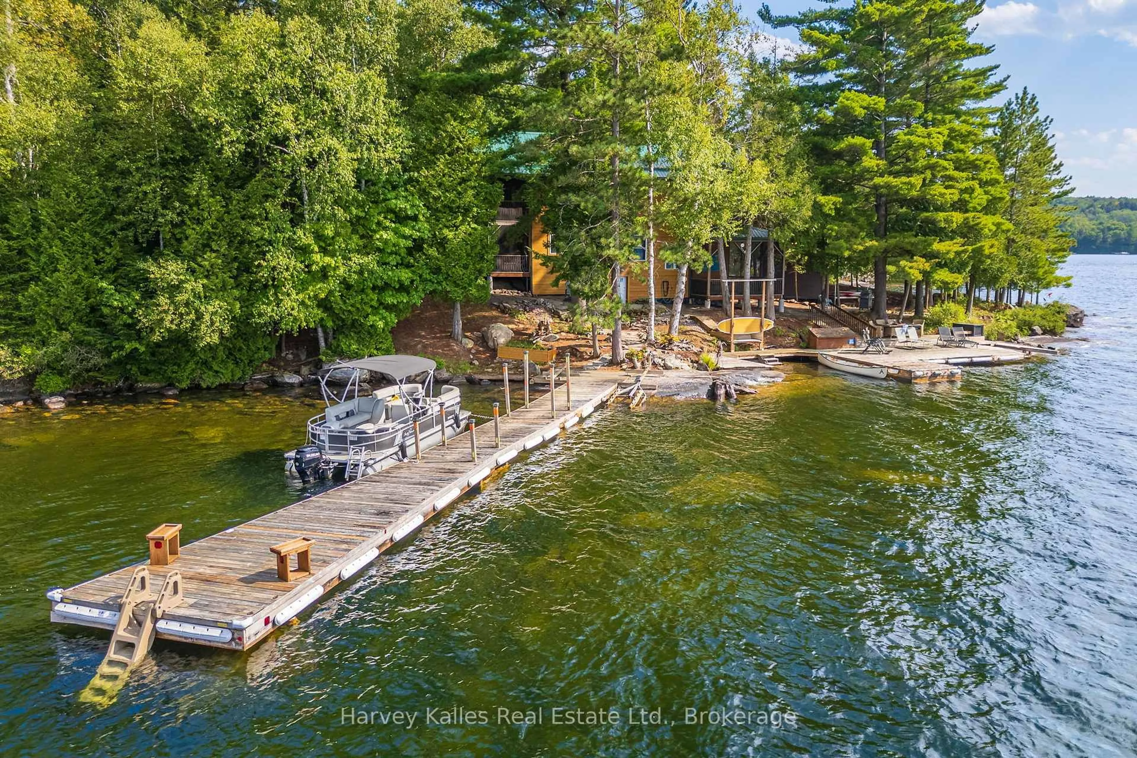 A pic from outside/outdoor area/front of a property/back of a property/a pic from drone, water/lake/river/ocean view for 19750 Kawagama Big Trout Island, Dysart et al Ontario P0A 1E0