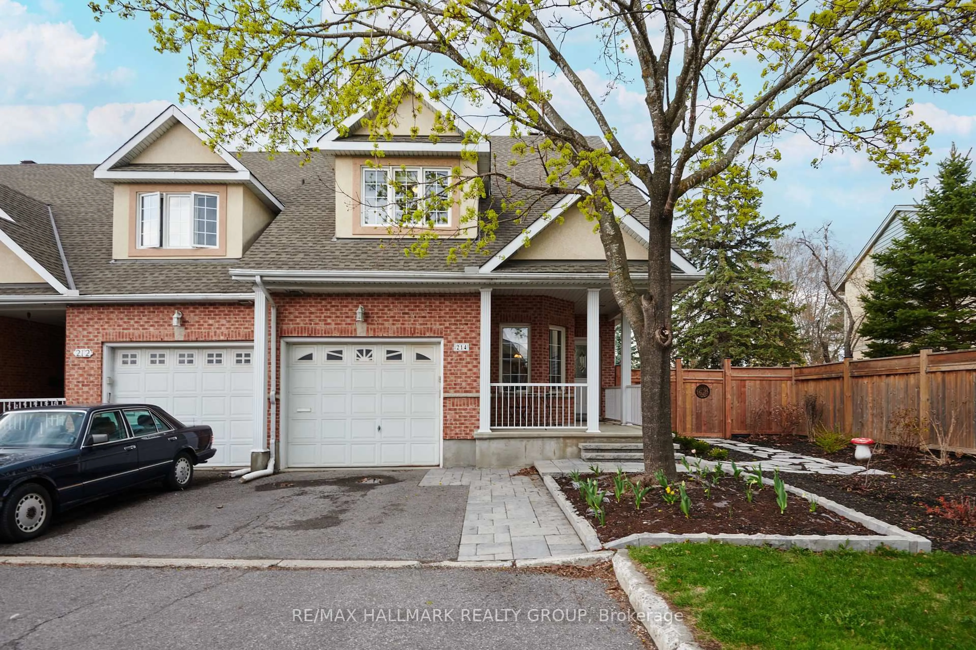Home with brick exterior material, street for 214 Laura Private, Ottawa Ontario K1B 1C8