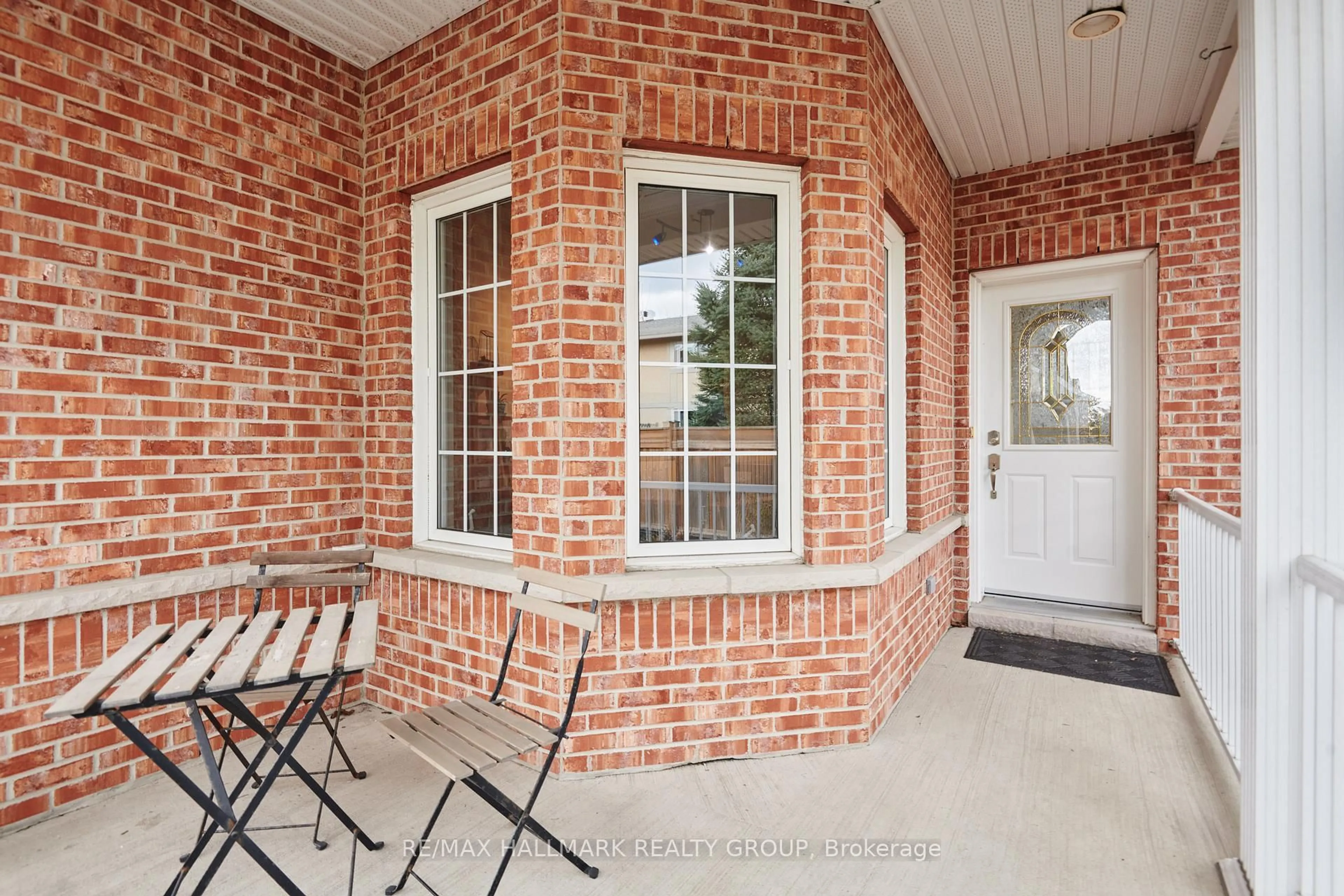 Home with brick exterior material, street for 214 Laura Private, Ottawa Ontario K1B 1C8