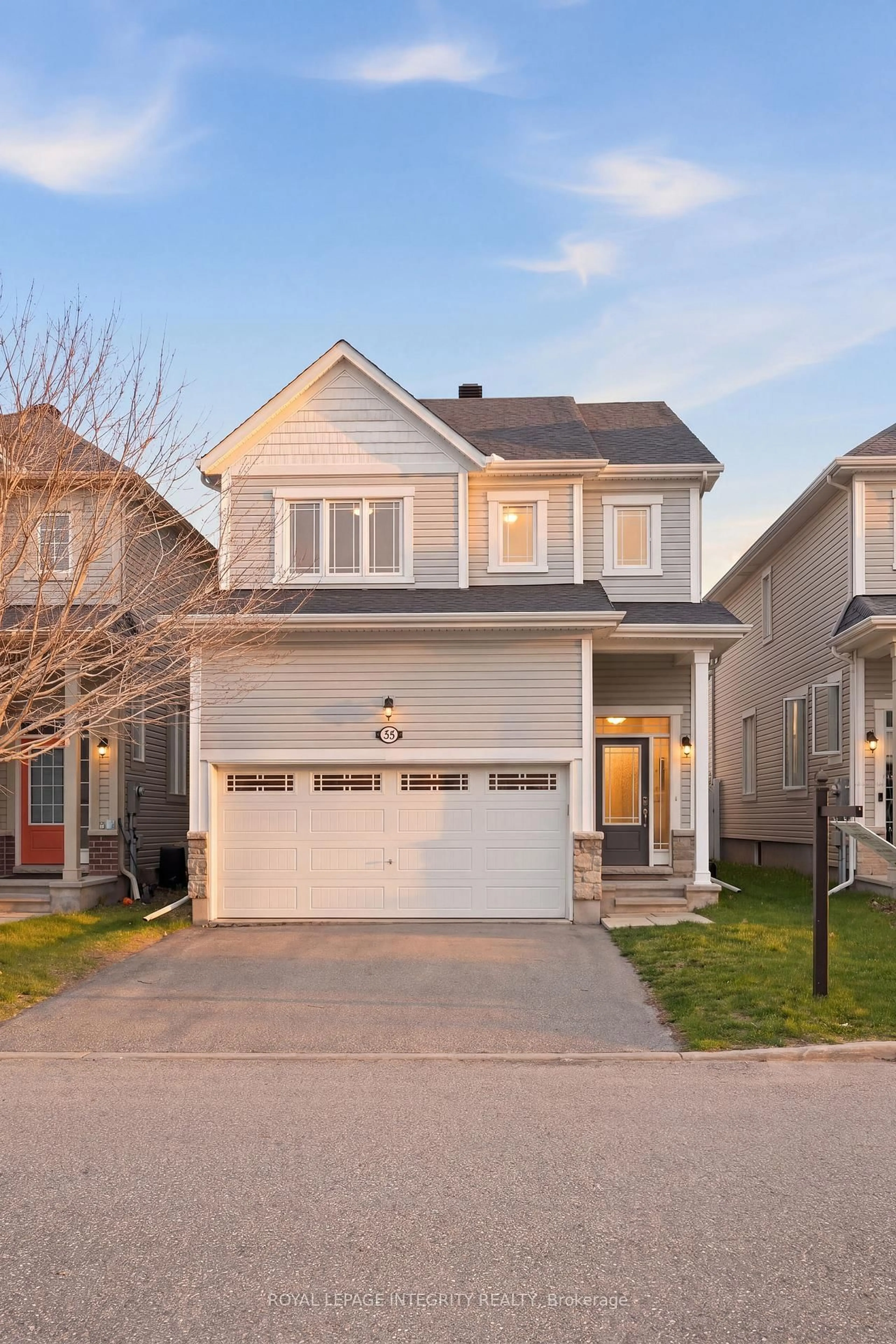 Home with vinyl exterior material, street for 322 Autumnfield St, Ottawa Ontario K2M 0J4