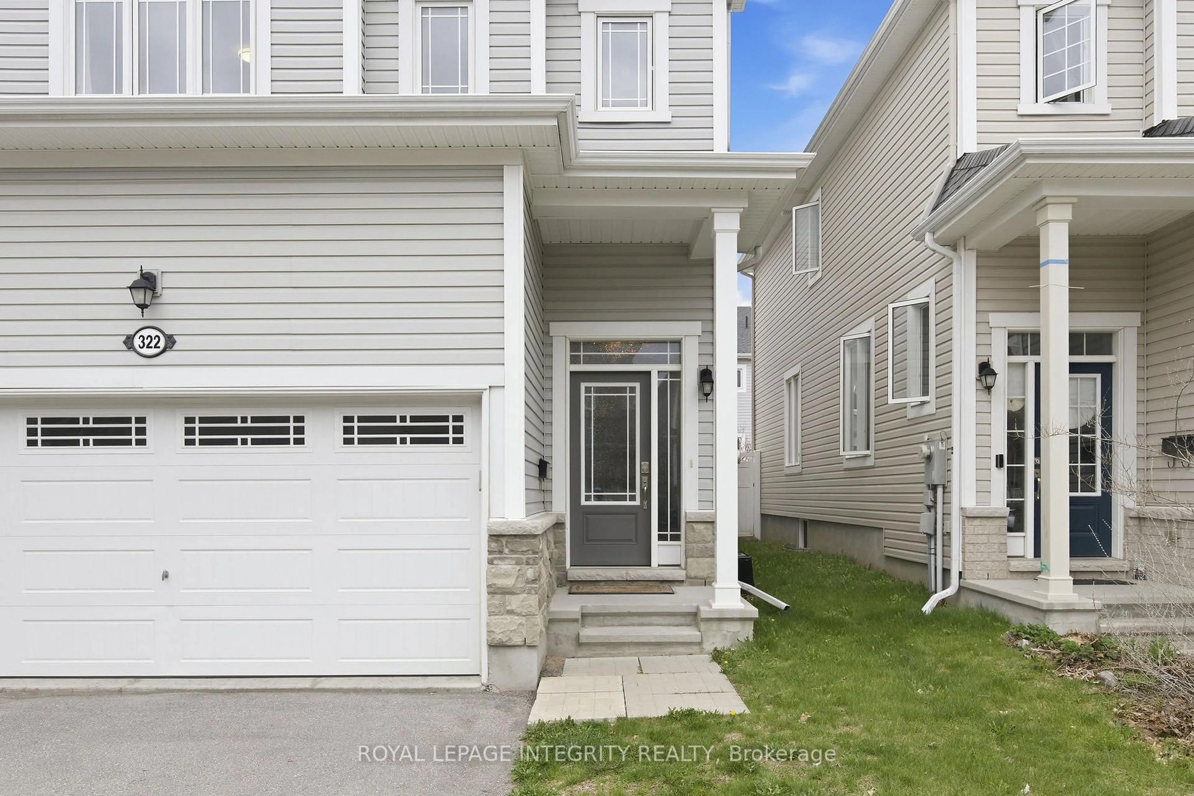Home with vinyl exterior material, street for 322 Autumnfield St, Ottawa Ontario K2M 0J4