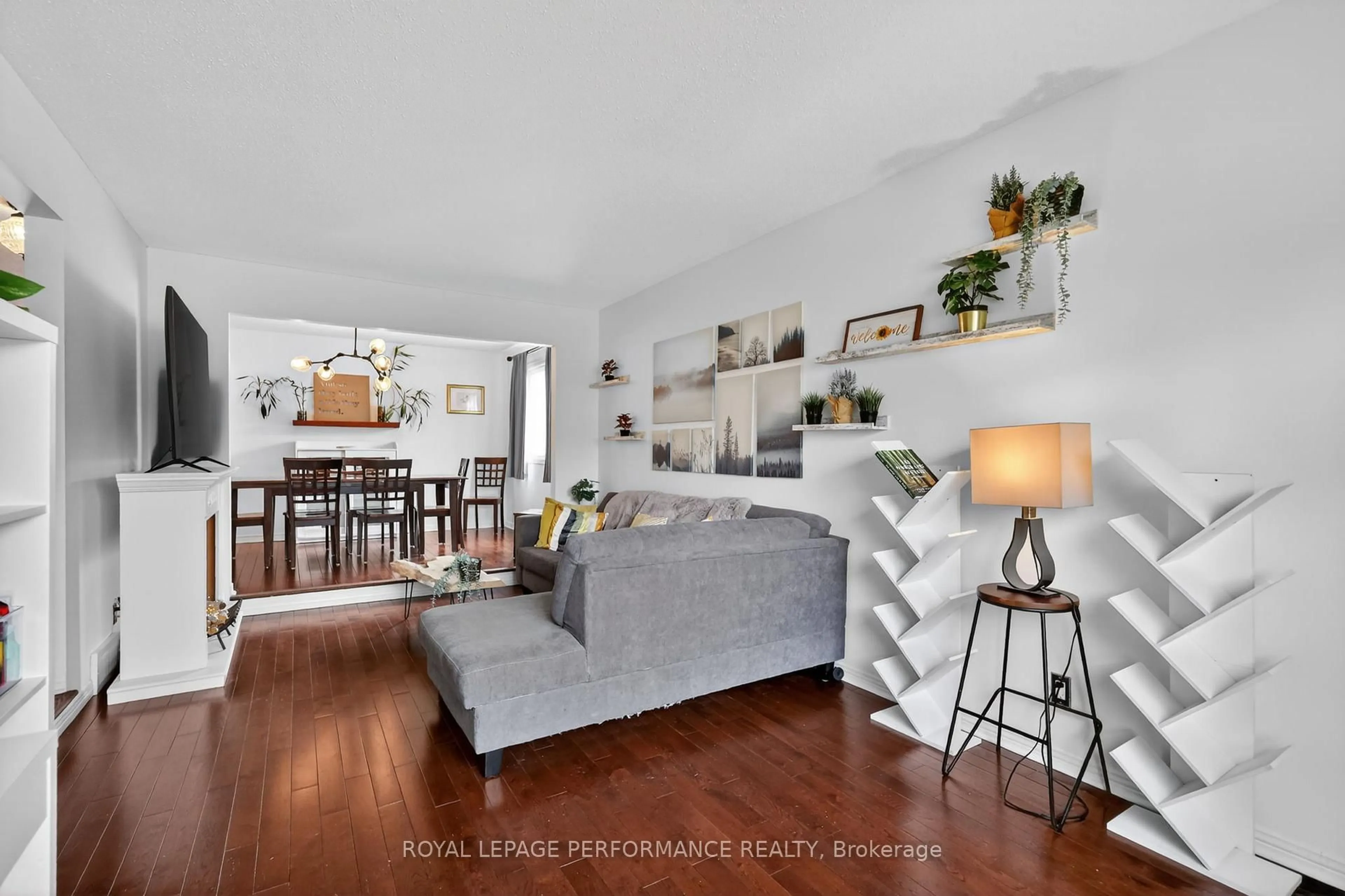 Living room with furniture, wood/laminate floor for 2 Canbury Cres, Ottawa Ontario K2G 4L4