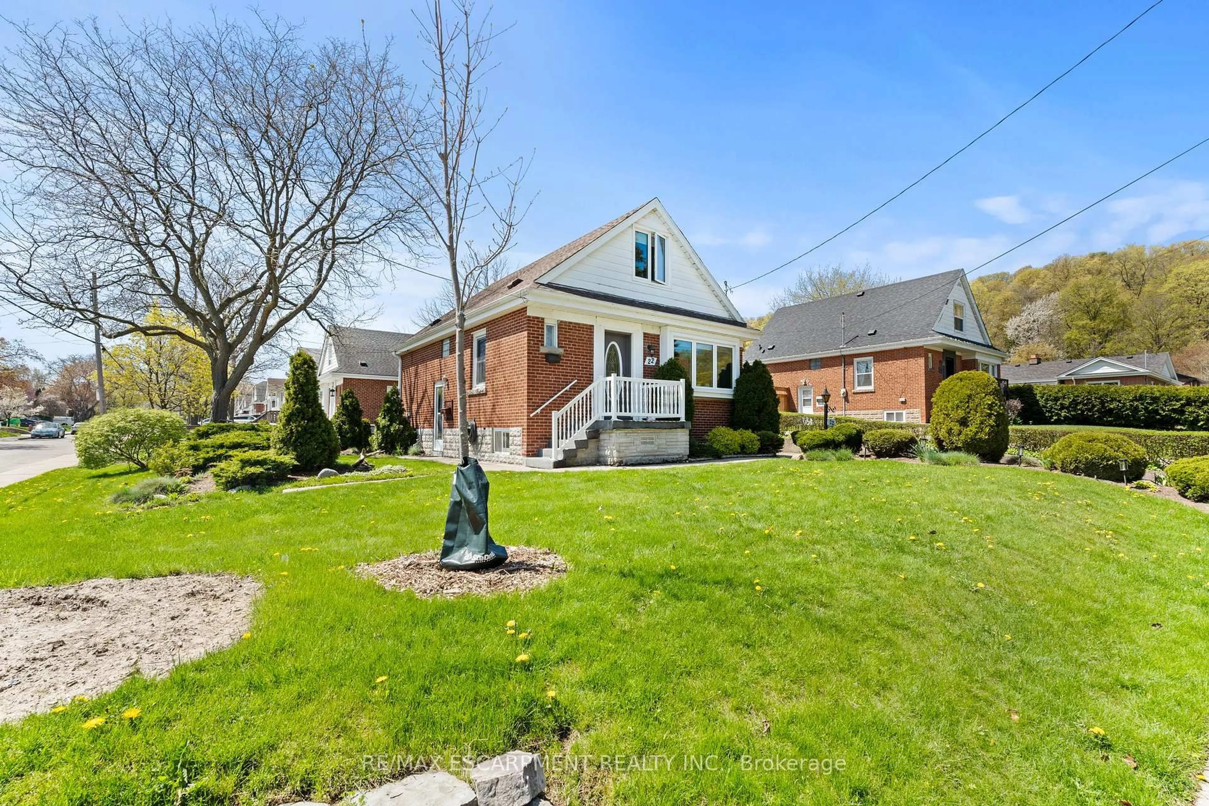 Home with brick exterior material, street for 22 Dundonald Ave, Hamilton Ontario L8K 4Z9