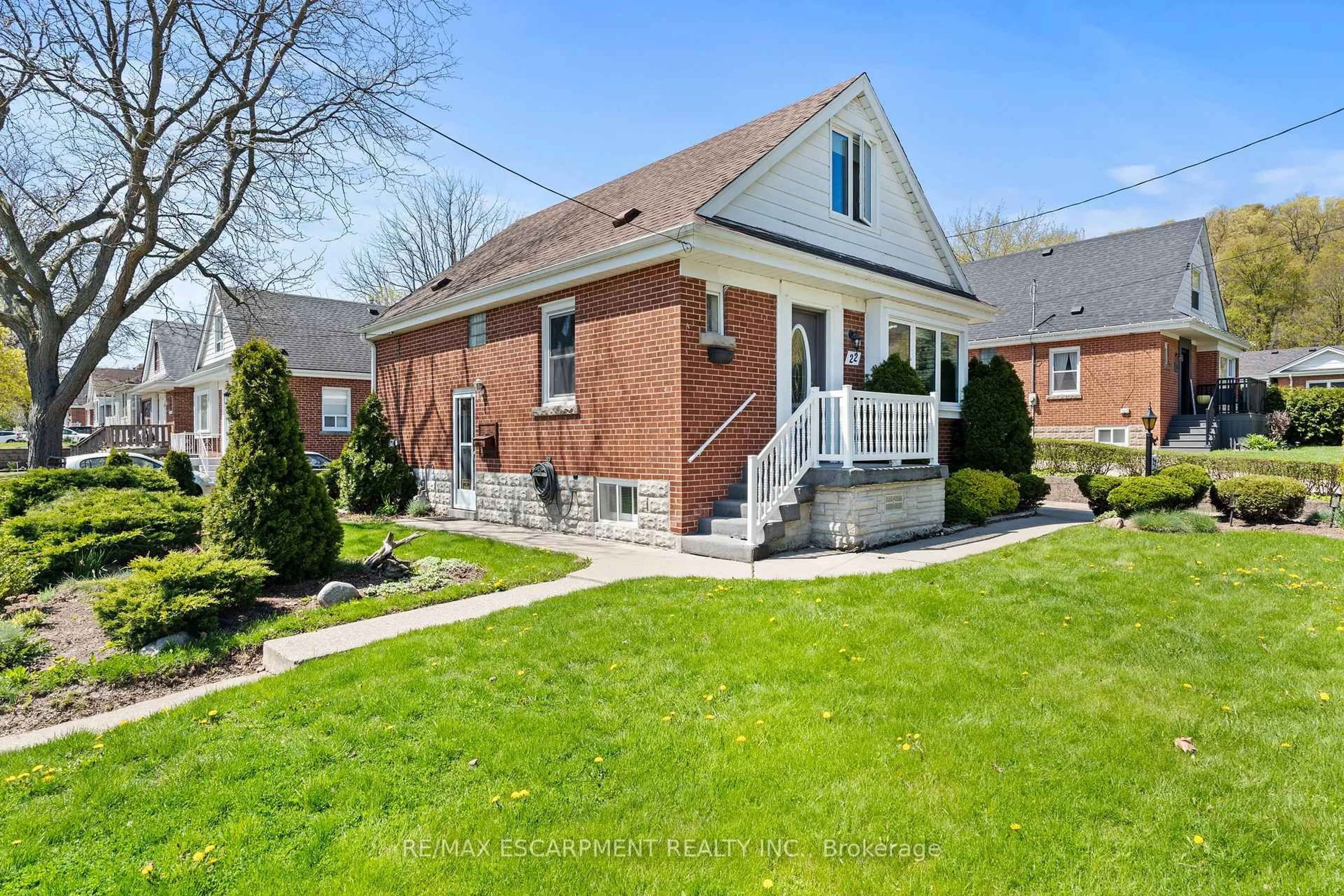 Home with brick exterior material, street for 22 Dundonald Ave, Hamilton Ontario L8K 4Z9