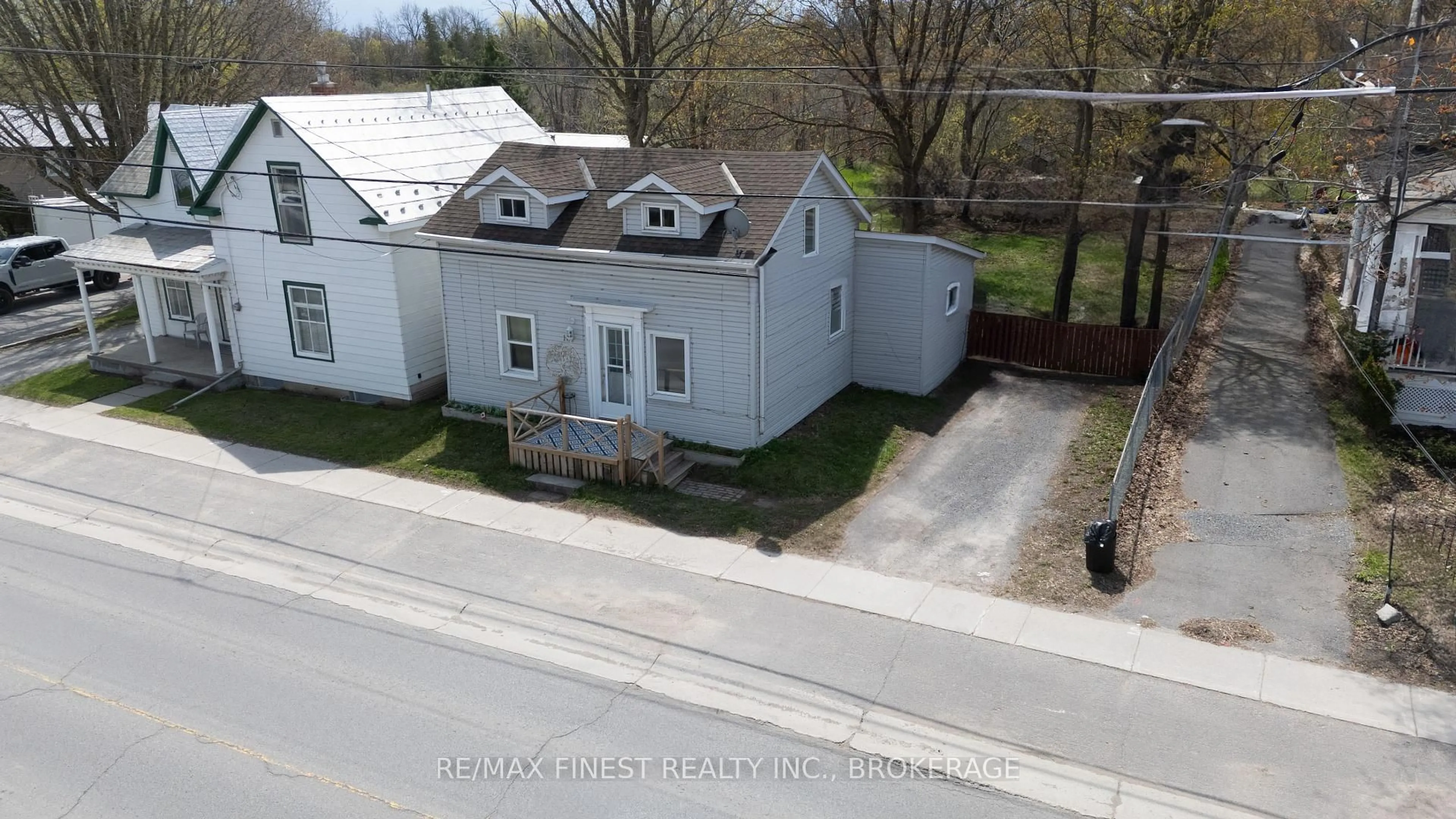 A pic from outside/outdoor area/front of a property/back of a property/a pic from drone, street for 167 Main St, Bissett Creek Ontario K0H 2H0