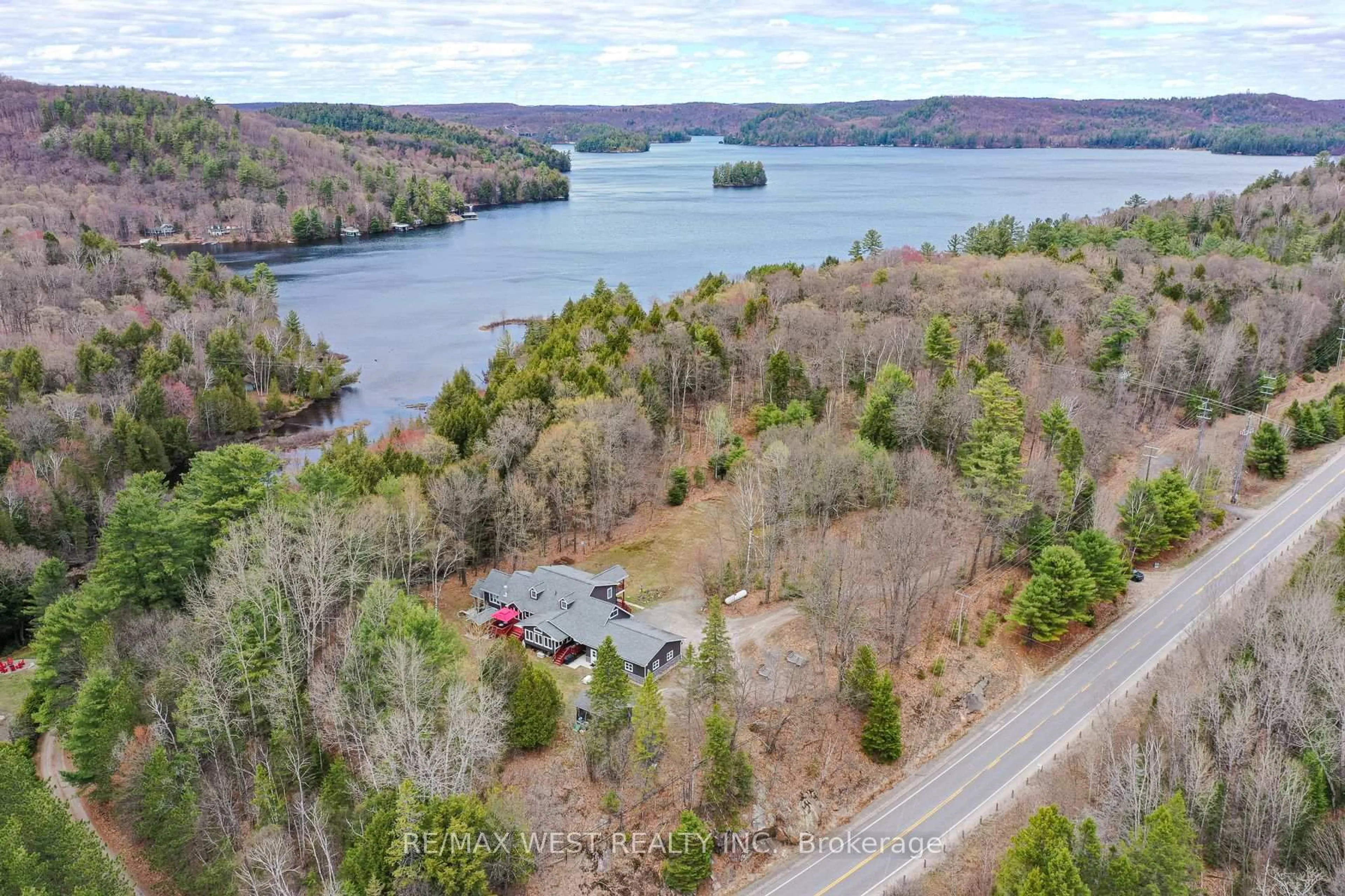 A pic from outside/outdoor area/front of a property/back of a property/a pic from drone, water/lake/river/ocean view for 4945 Muskoka 117 Rd, Lake of Bays Ontario P0A 1E0