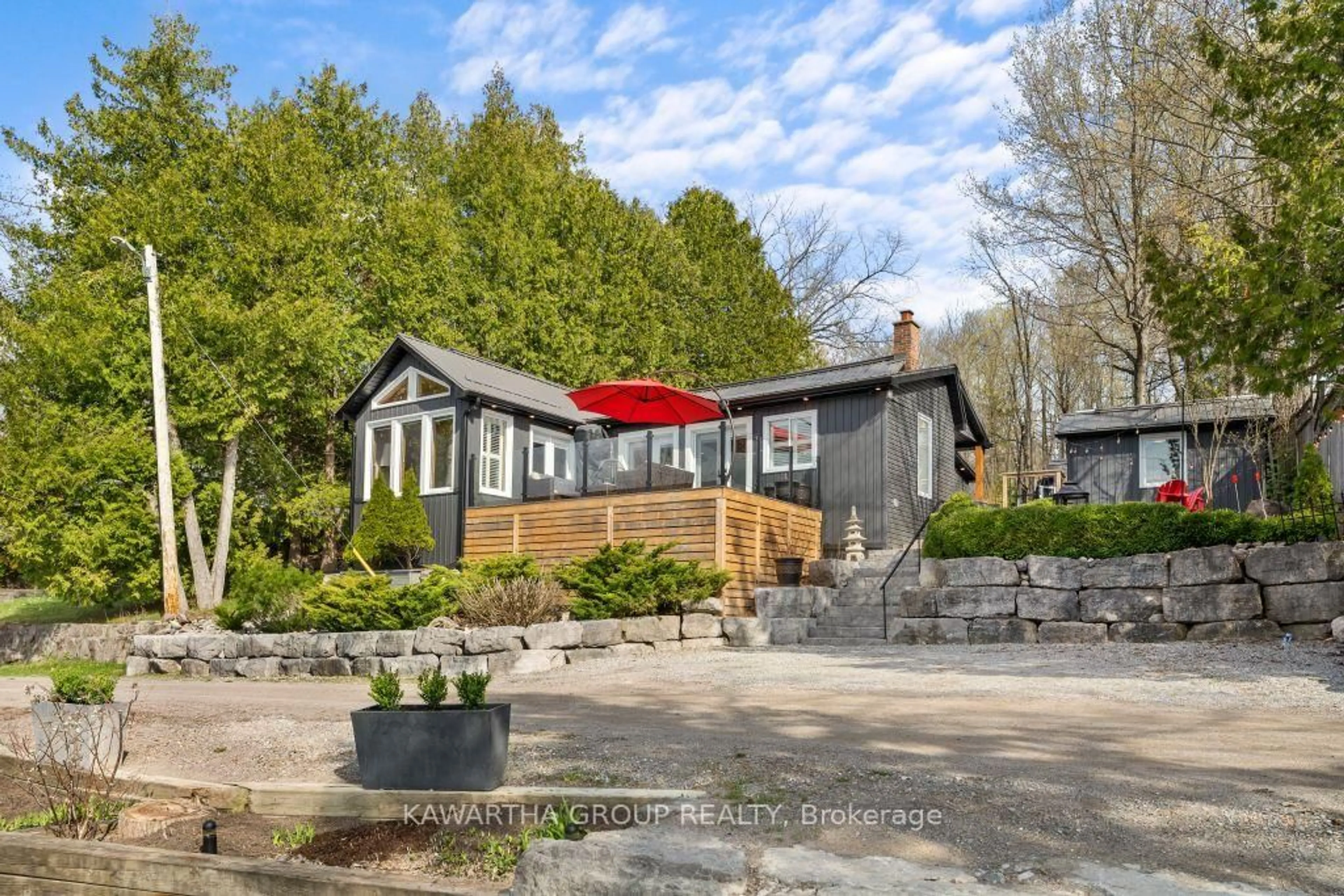 A pic from outside/outdoor area/front of a property/back of a property/a pic from drone, unknown for 79 Grove Rd, Kawartha Lakes Ontario K0M 1N0