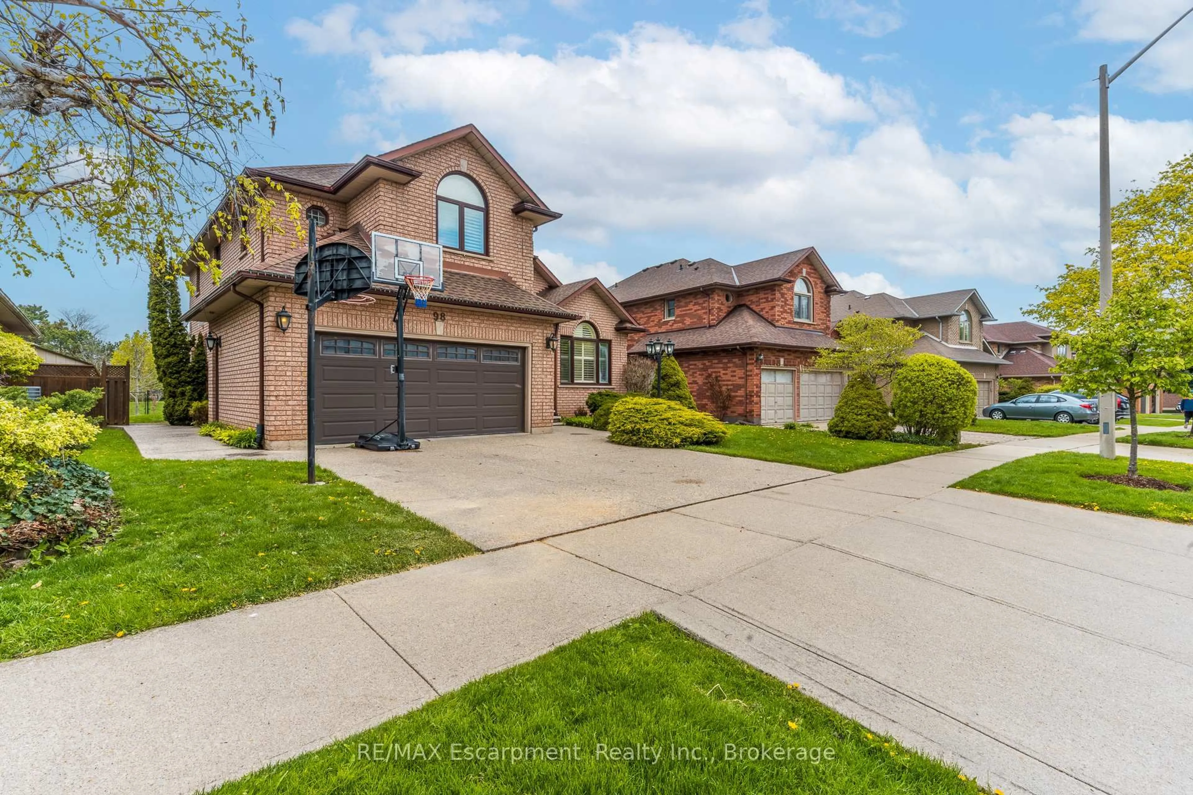 Home with brick exterior material, street for 98 Glenhollow Dr, Hamilton Ontario K8J 3R4