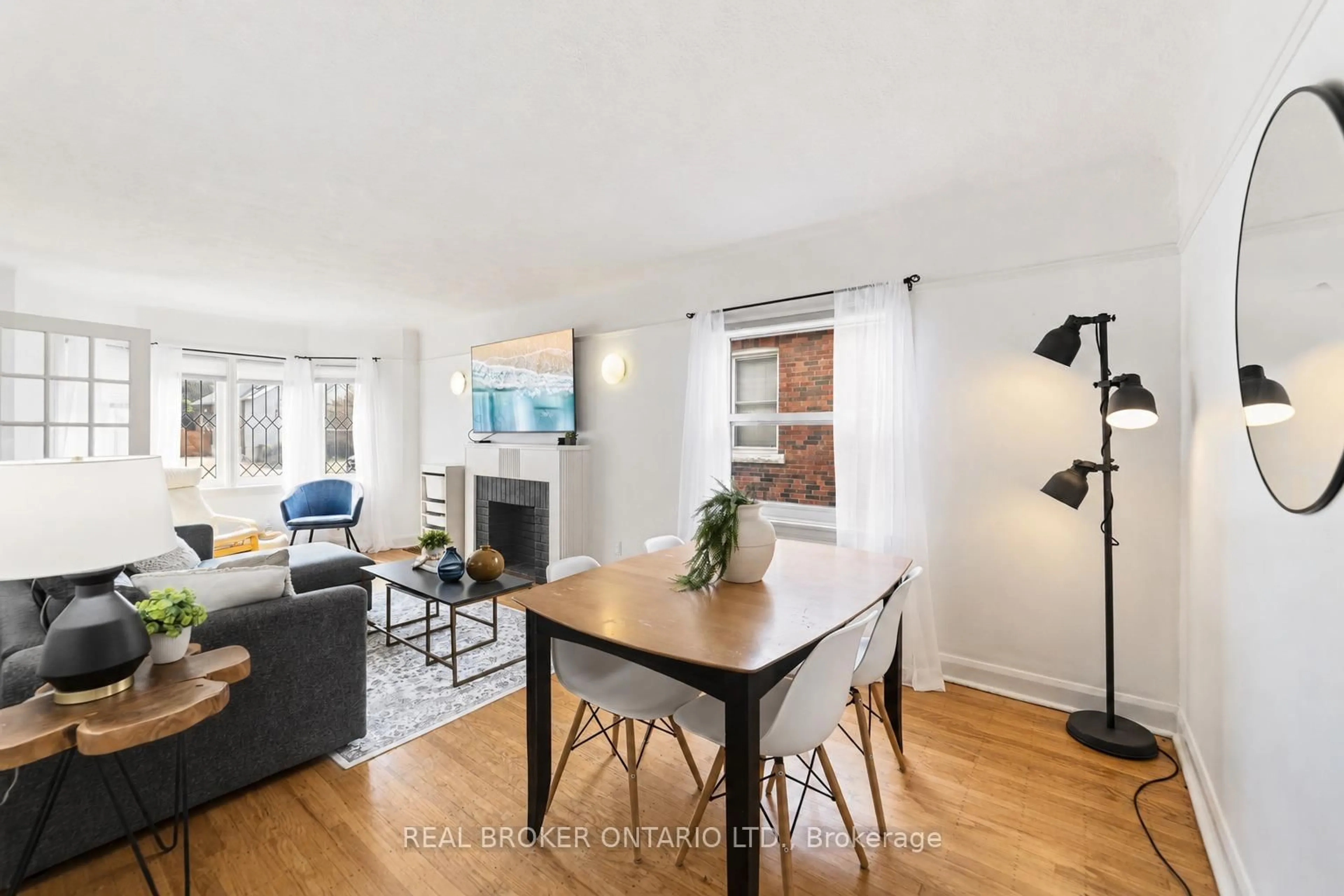 Living room with furniture, wood/laminate floor for 8 Barons Ave, Hamilton Ontario L8K 2X9