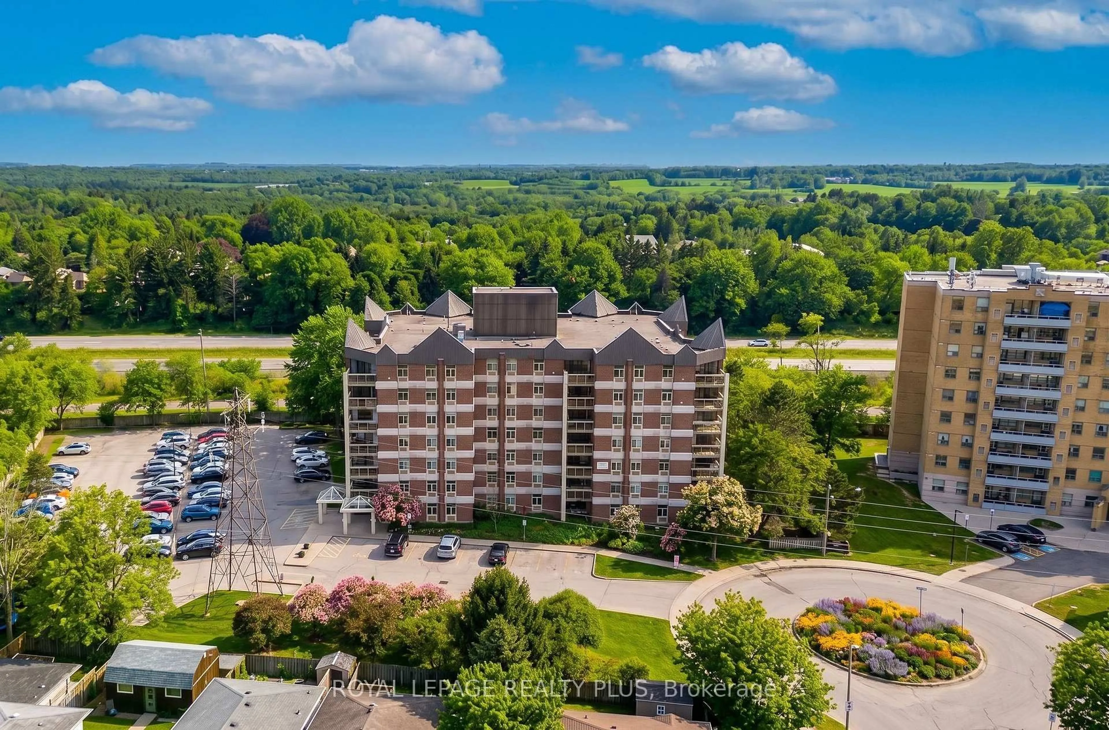 A pic from outside/outdoor area/front of a property/back of a property/a pic from drone, building for 8 Christopher Crt #603, Guelph Ontario N1G 4N7