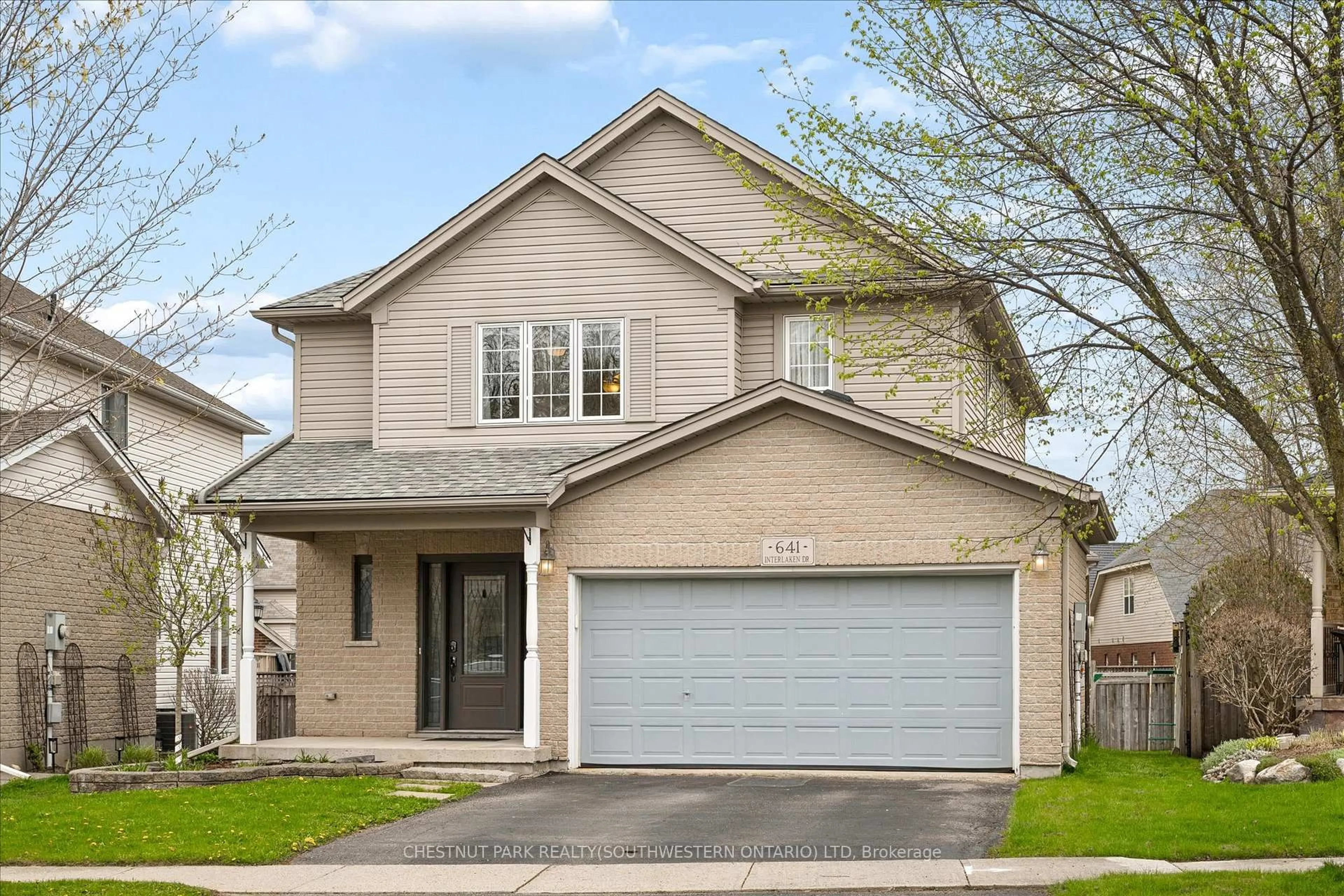 Home with vinyl exterior material, street for 641 Interlaken Dr, Waterloo Ontario N2T 2Y5