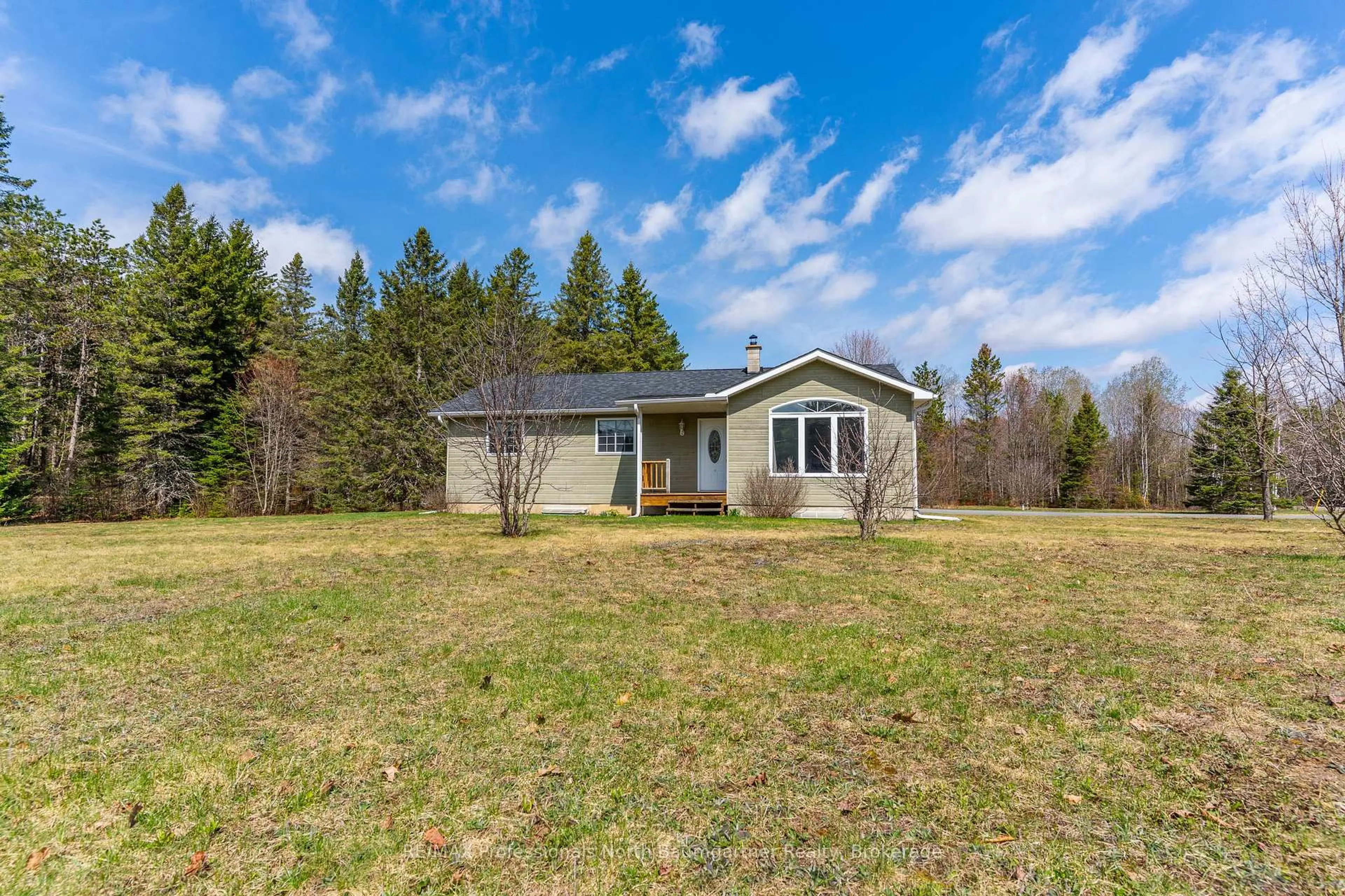 A pic from outside/outdoor area/front of a property/back of a property/a pic from drone, unknown for 1009 Outram Rd, Highlands East Ontario K0L 3C0