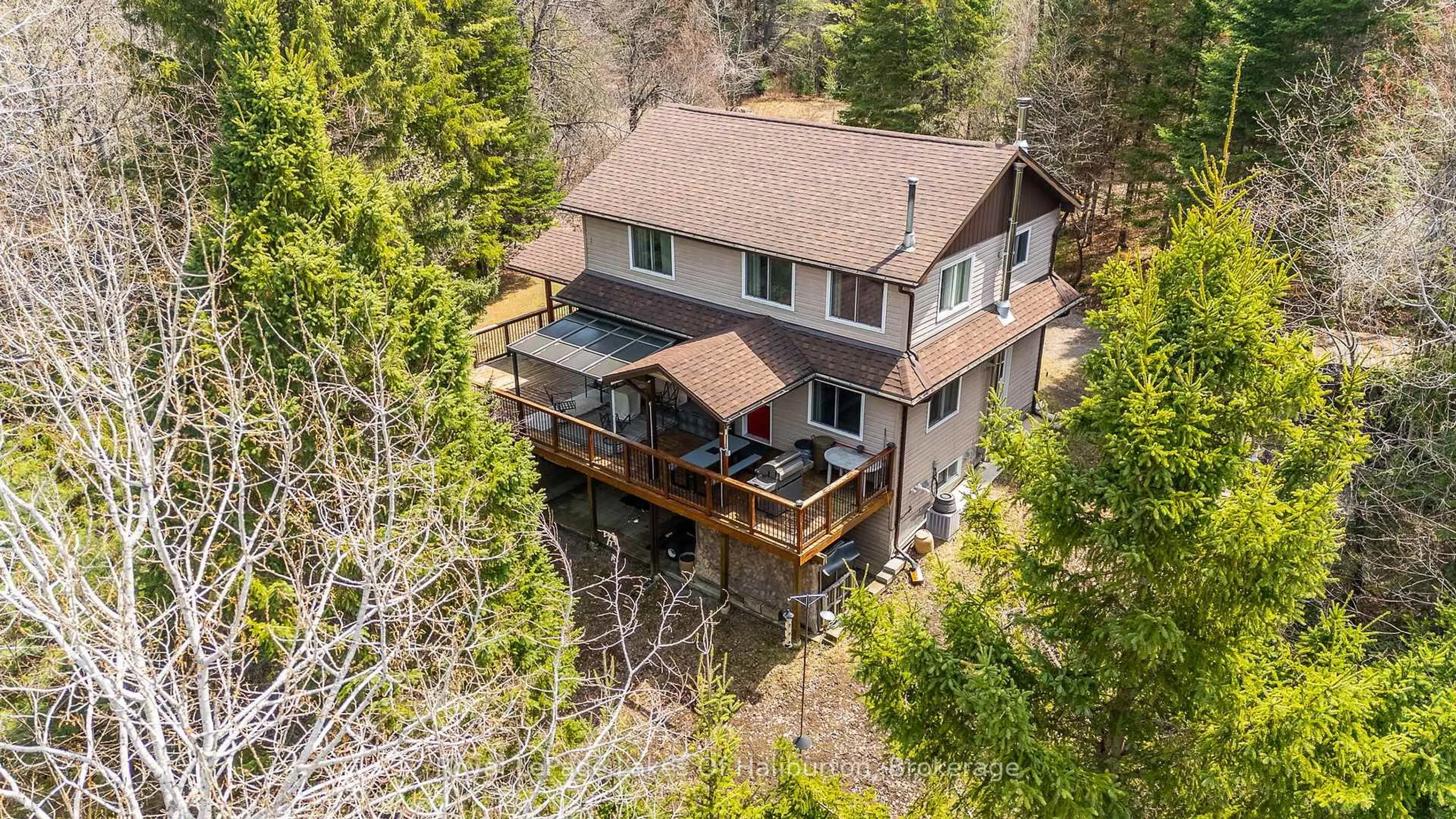 A pic from outside/outdoor area/front of a property/back of a property/a pic from drone, water/lake/river/ocean view for 1033 Bayberry Lane, Highlands East Ontario K0M 1R0