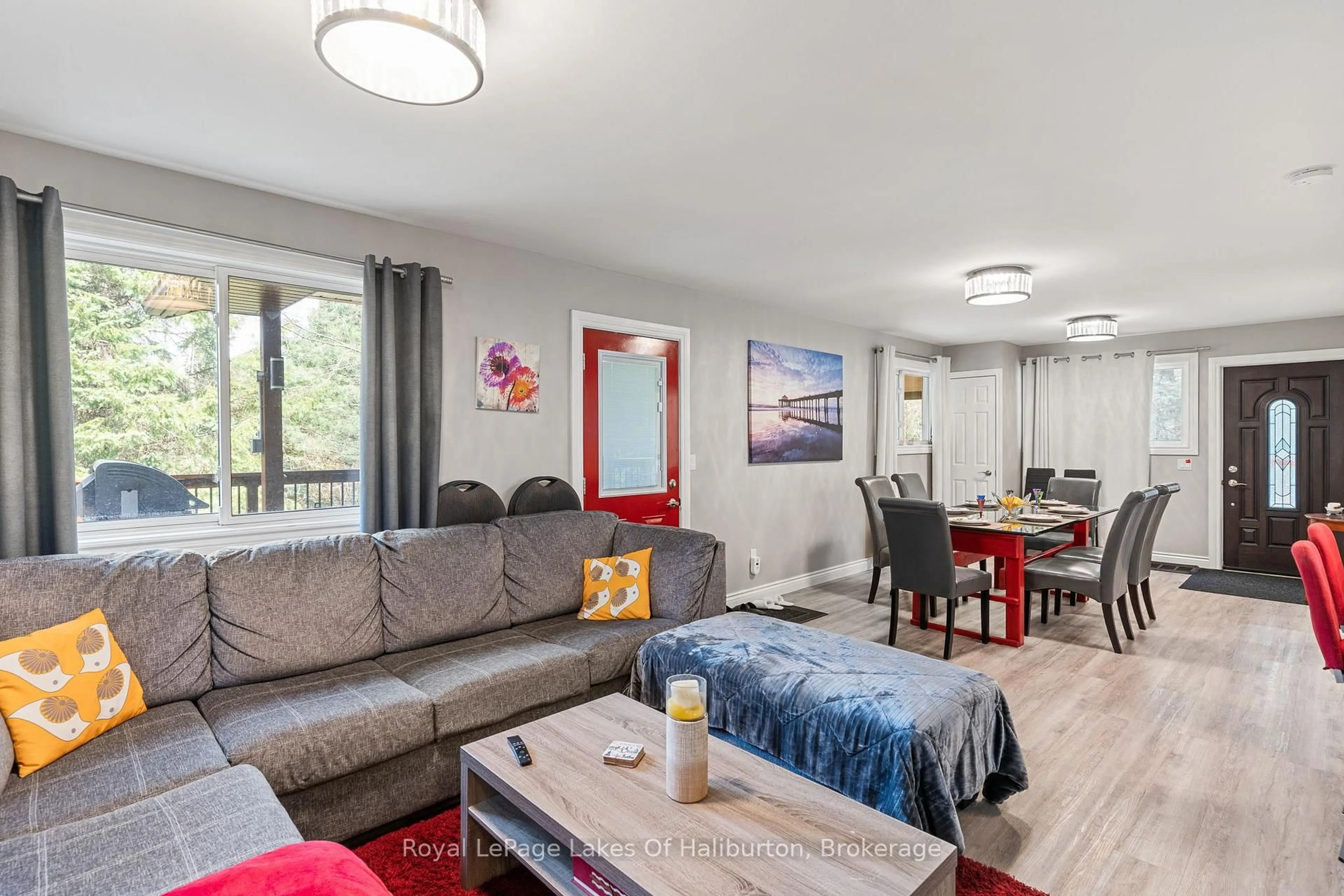 Living room with furniture, wood/laminate floor for 1033 Bayberry Lane, Highlands East Ontario K0M 1R0