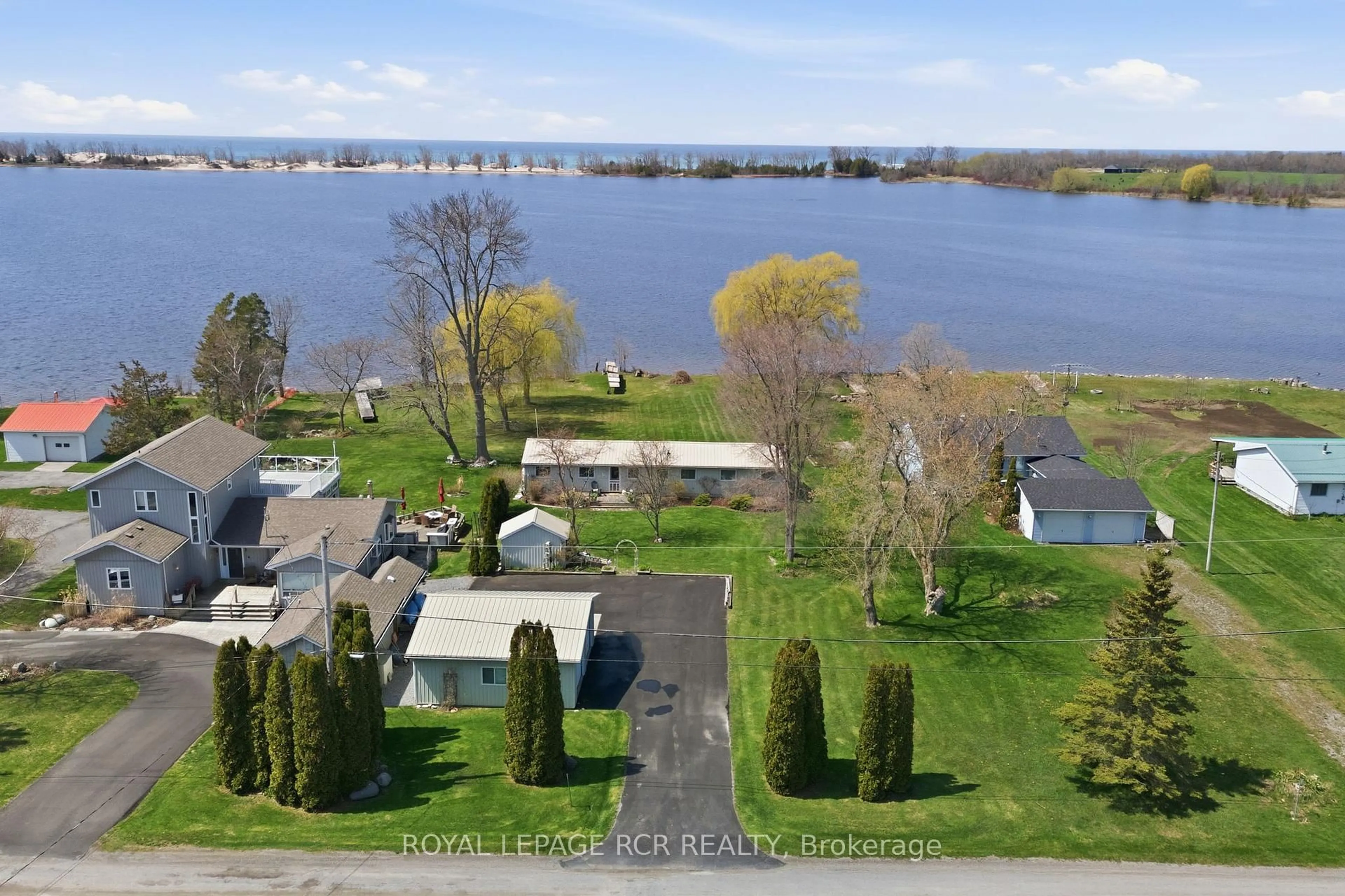 A pic from outside/outdoor area/front of a property/back of a property/a pic from drone, water/lake/river/ocean view for 130 Ould Dr, Prince Edward County Ontario K0K 1T0