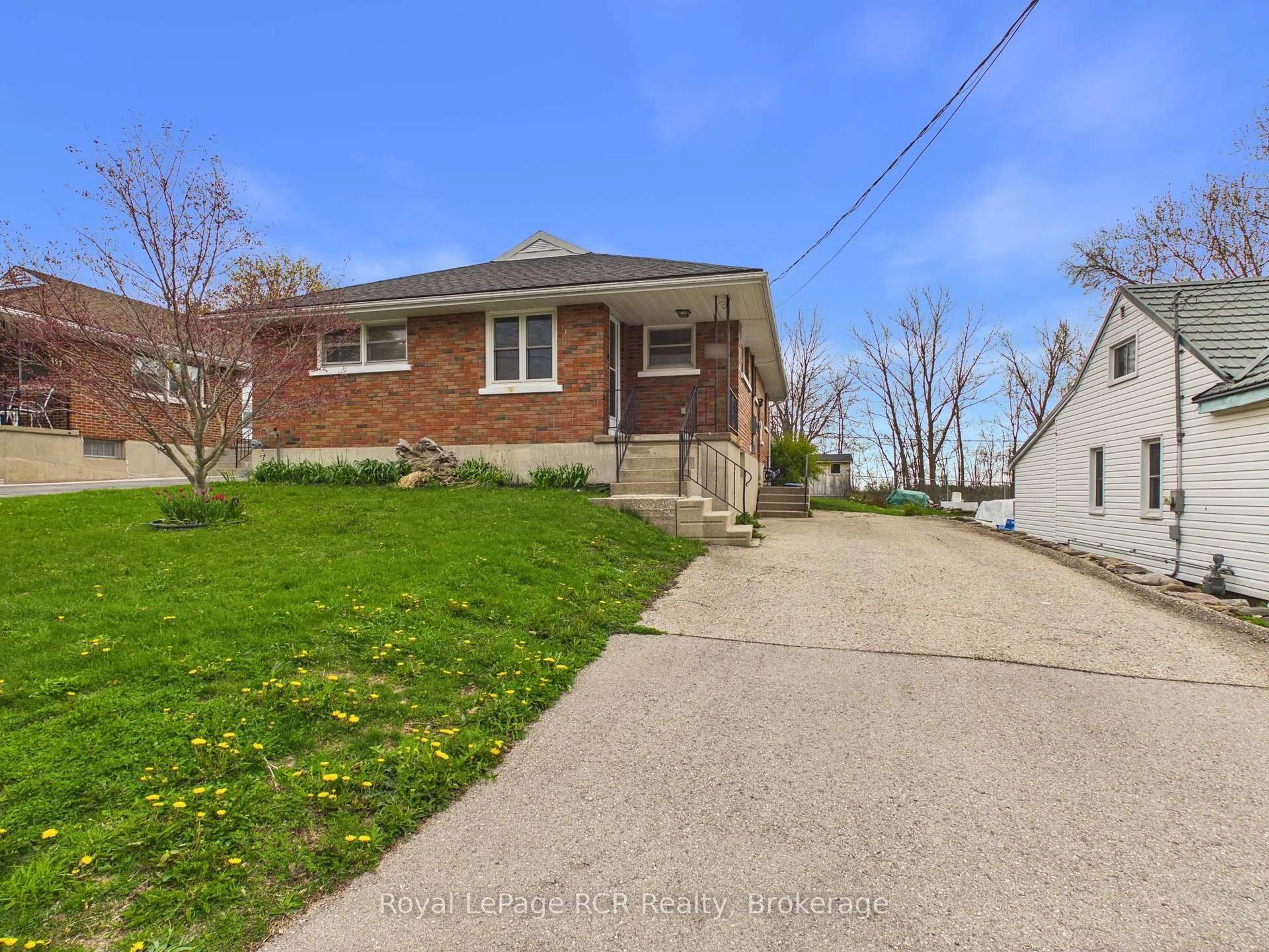 A pic from outside/outdoor area/front of a property/back of a property/a pic from drone, street for 153 Carling Terr, North Huron Ontario N0G 2W0