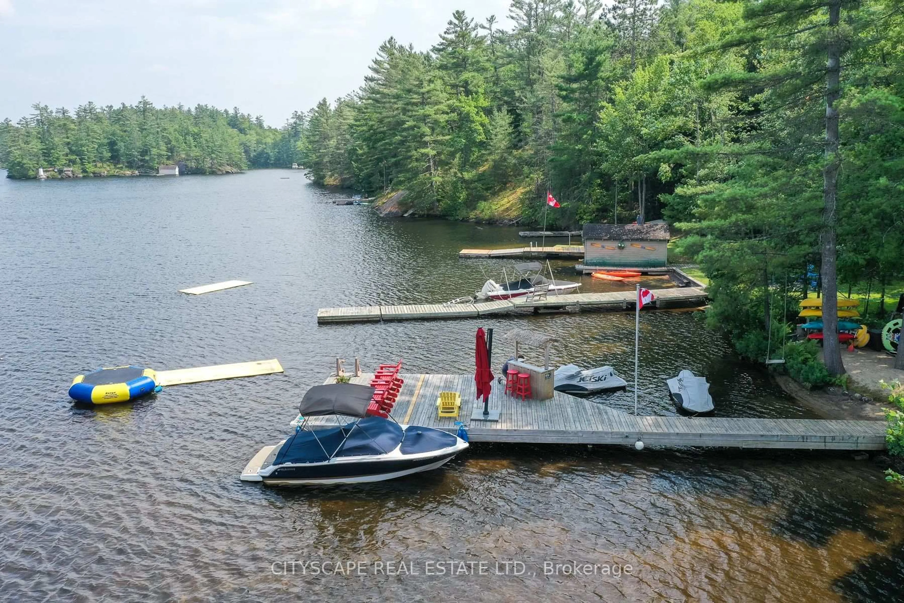 A pic from outside/outdoor area/front of a property/back of a property/a pic from drone, water/lake/river/ocean view for 1100 Hewitt St #2, Gravenhurst Ontario P1P 1R3