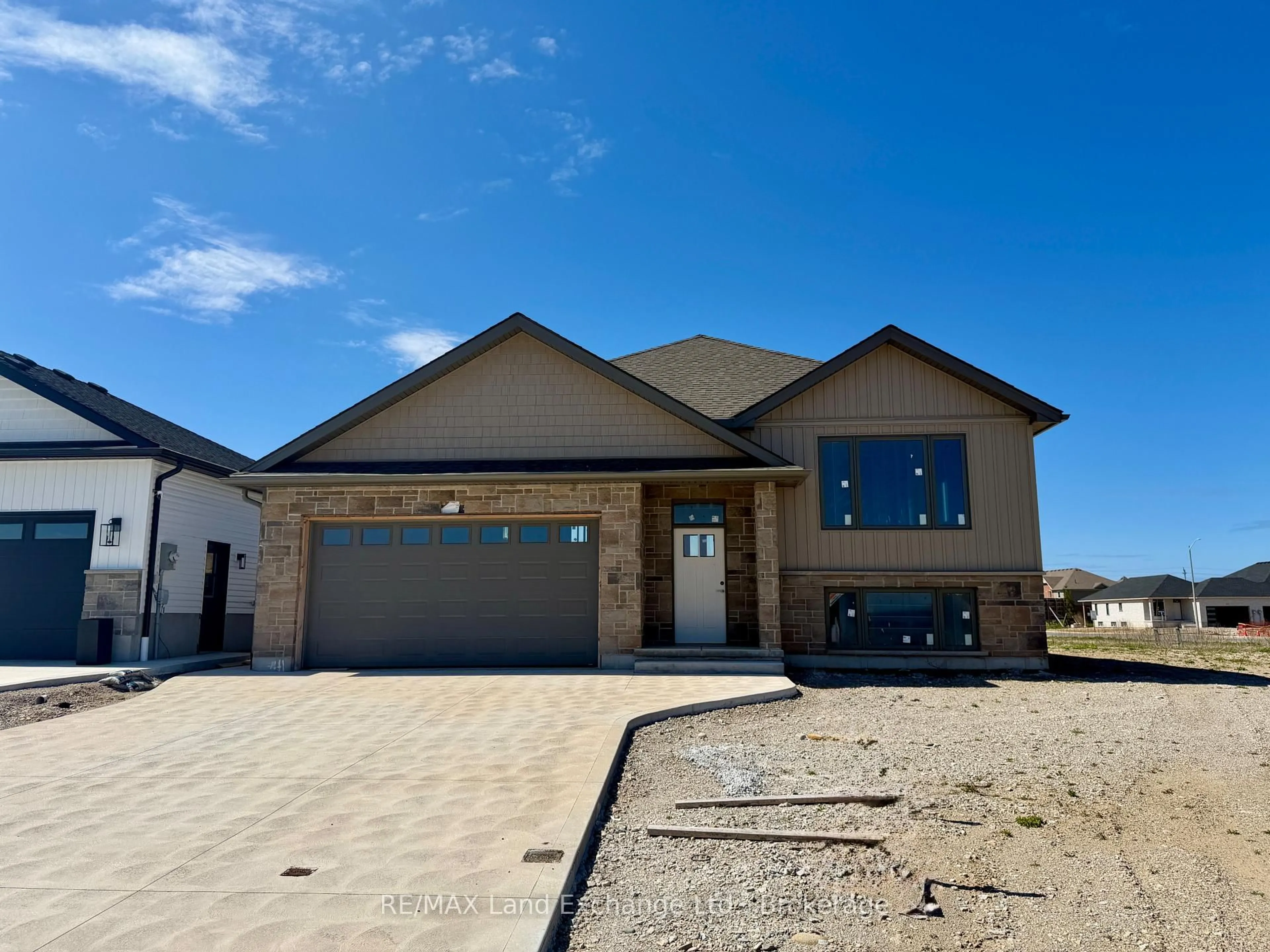 Home with brick exterior material, street for 418 Northport Dr, Saugeen Shores Ontario N0H 2C8