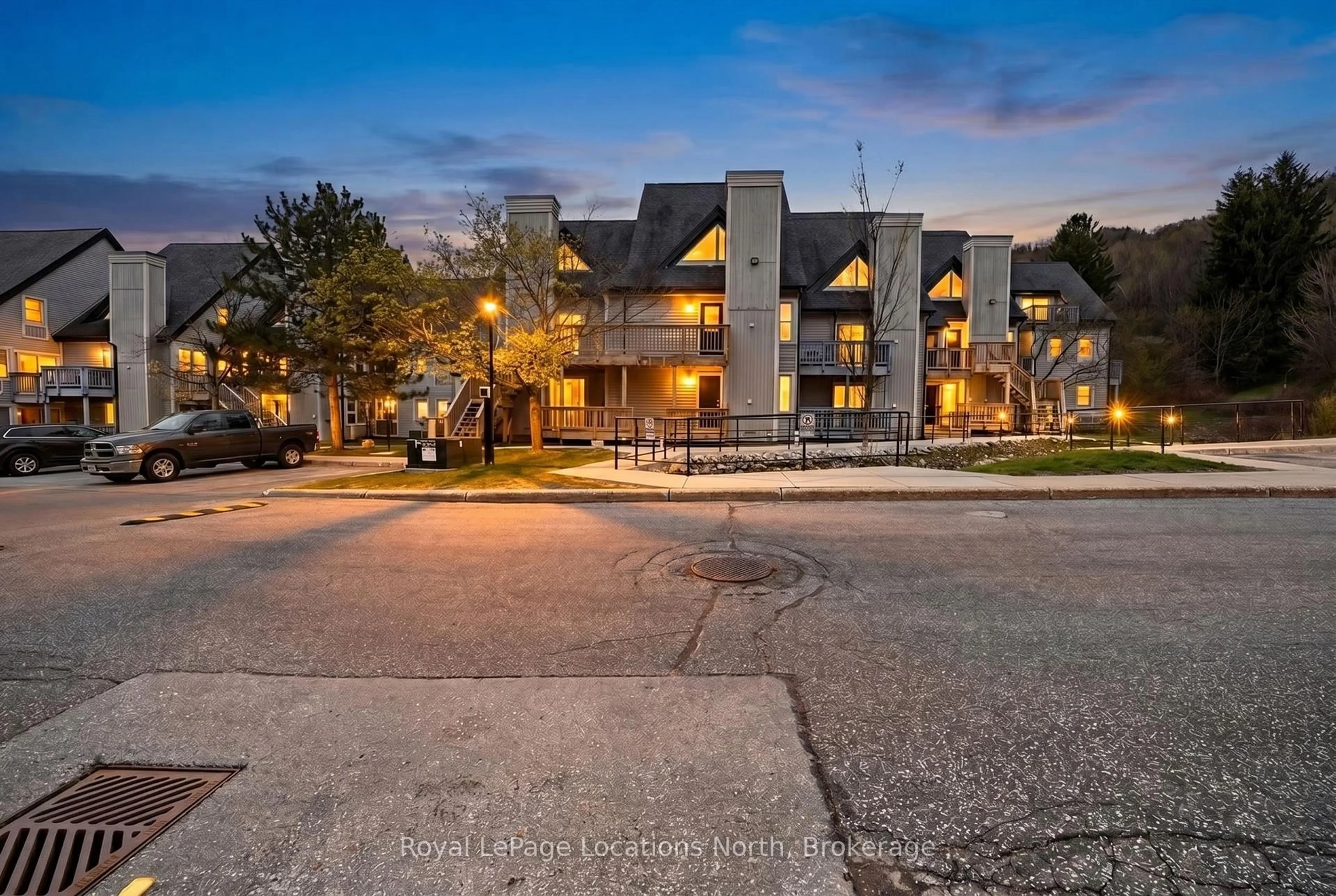 A pic from outside/outdoor area/front of a property/back of a property/a pic from drone, street for 796468 Grey Road 19 Rd #610, Blue Mountains Ontario L9Y 0N6