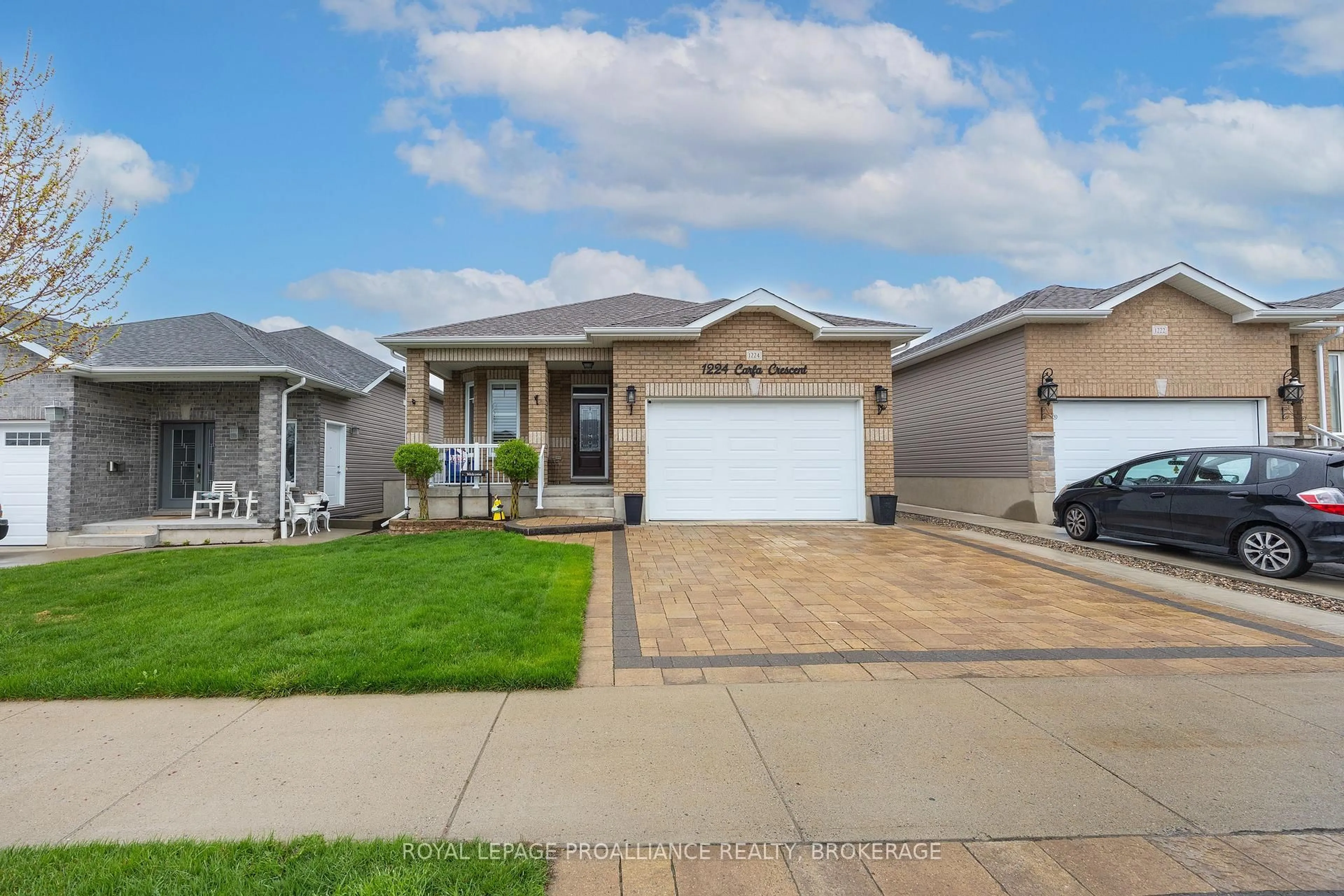 Home with vinyl exterior material, street for 1224 Carfa Cres, Kingston Ontario K7P 0M7
